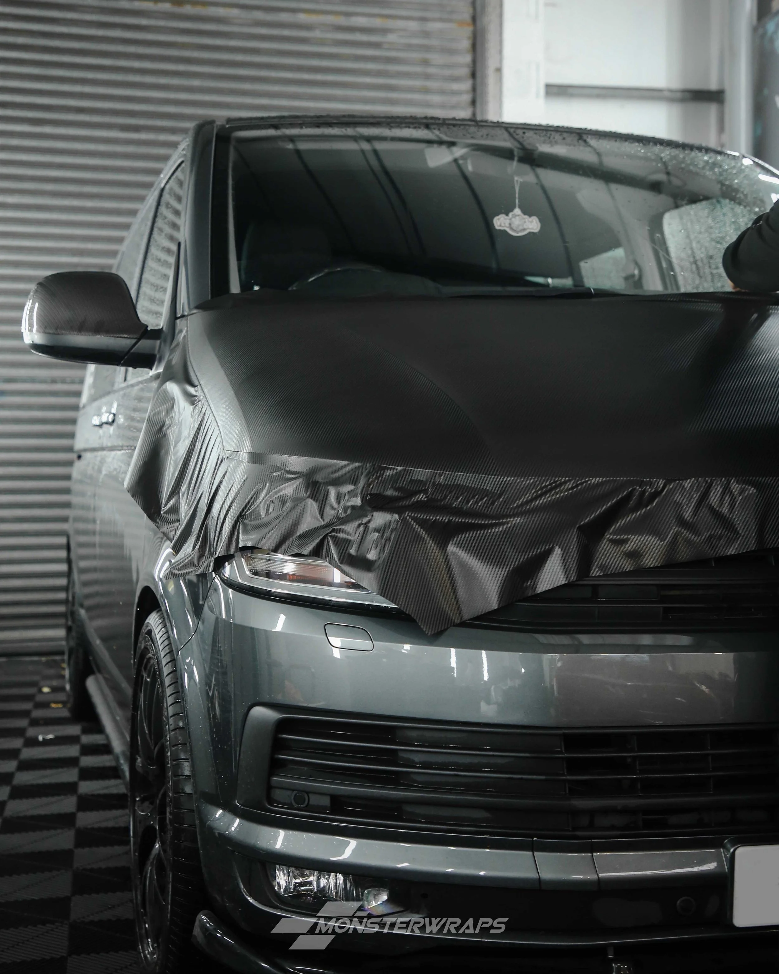 vw transporter t6 bonnet wrapped in 3M textured black carbon fibre
