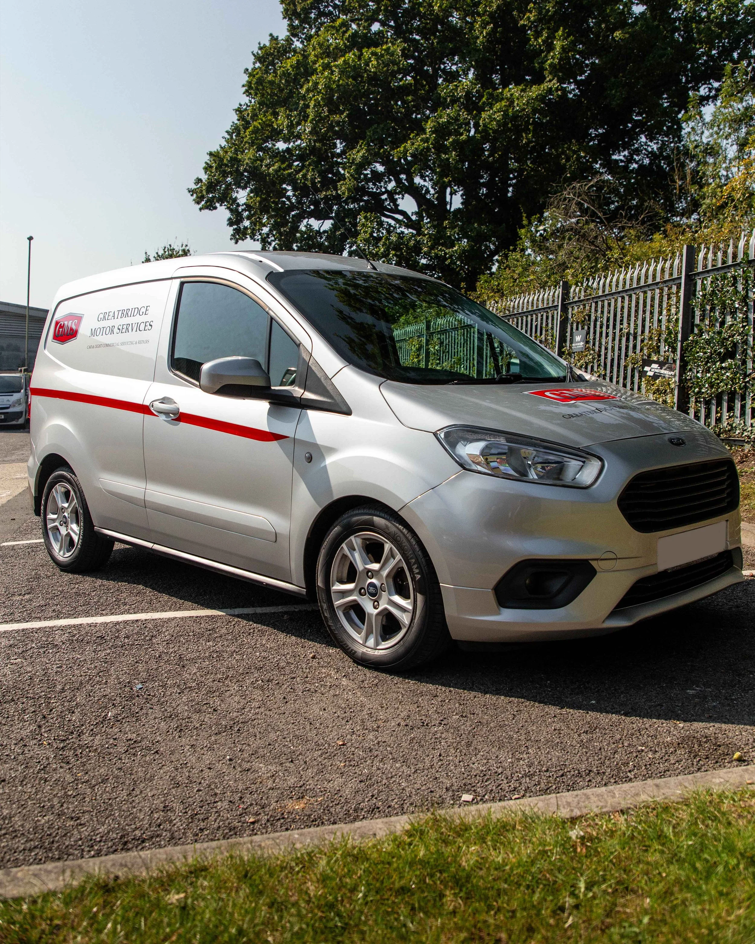 Ford Transit Courier van signwritten and wrapped for Greatbridge Motor Services