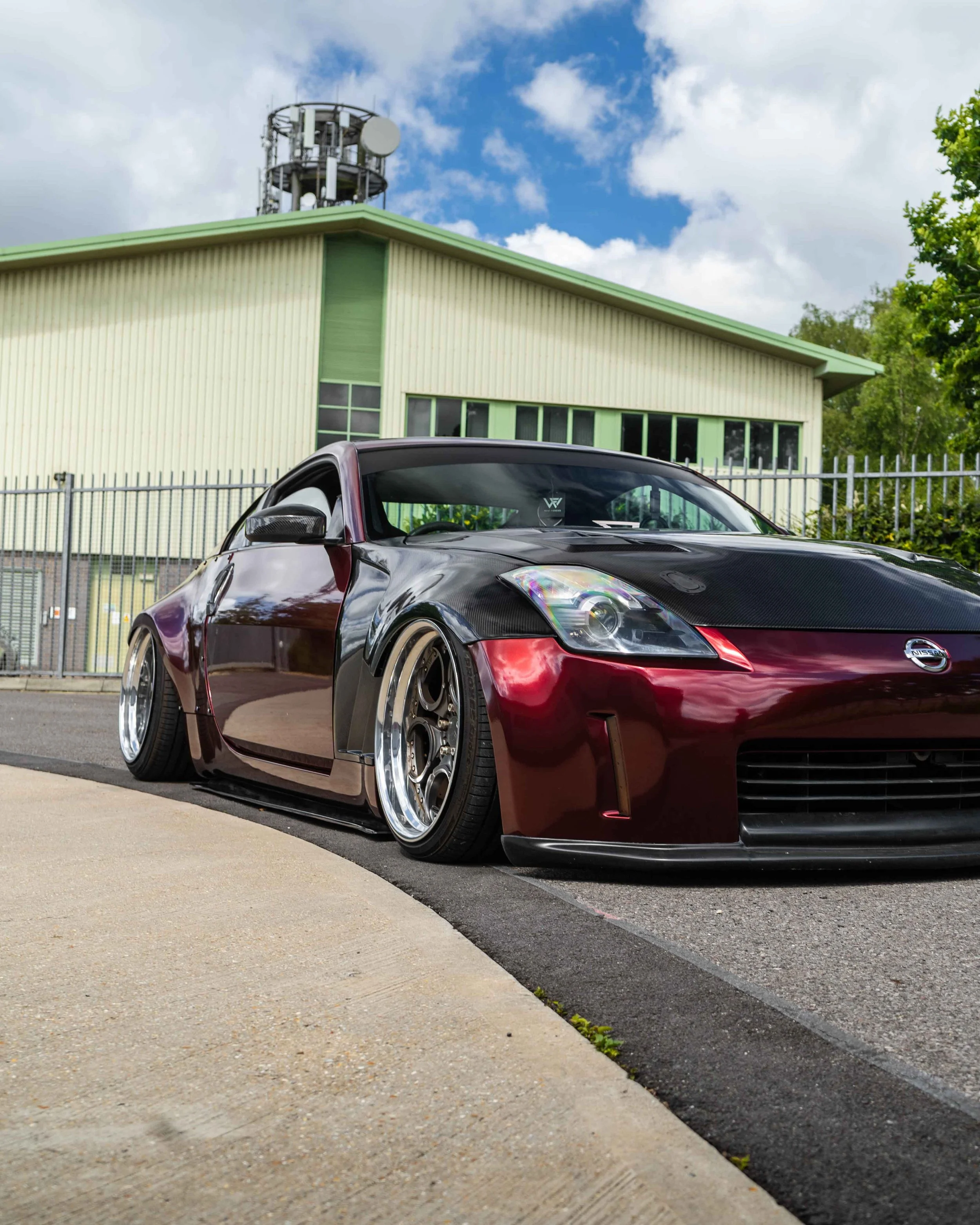 Nissan 350Z full colour change wrap in Gloss Red Black Iridescent