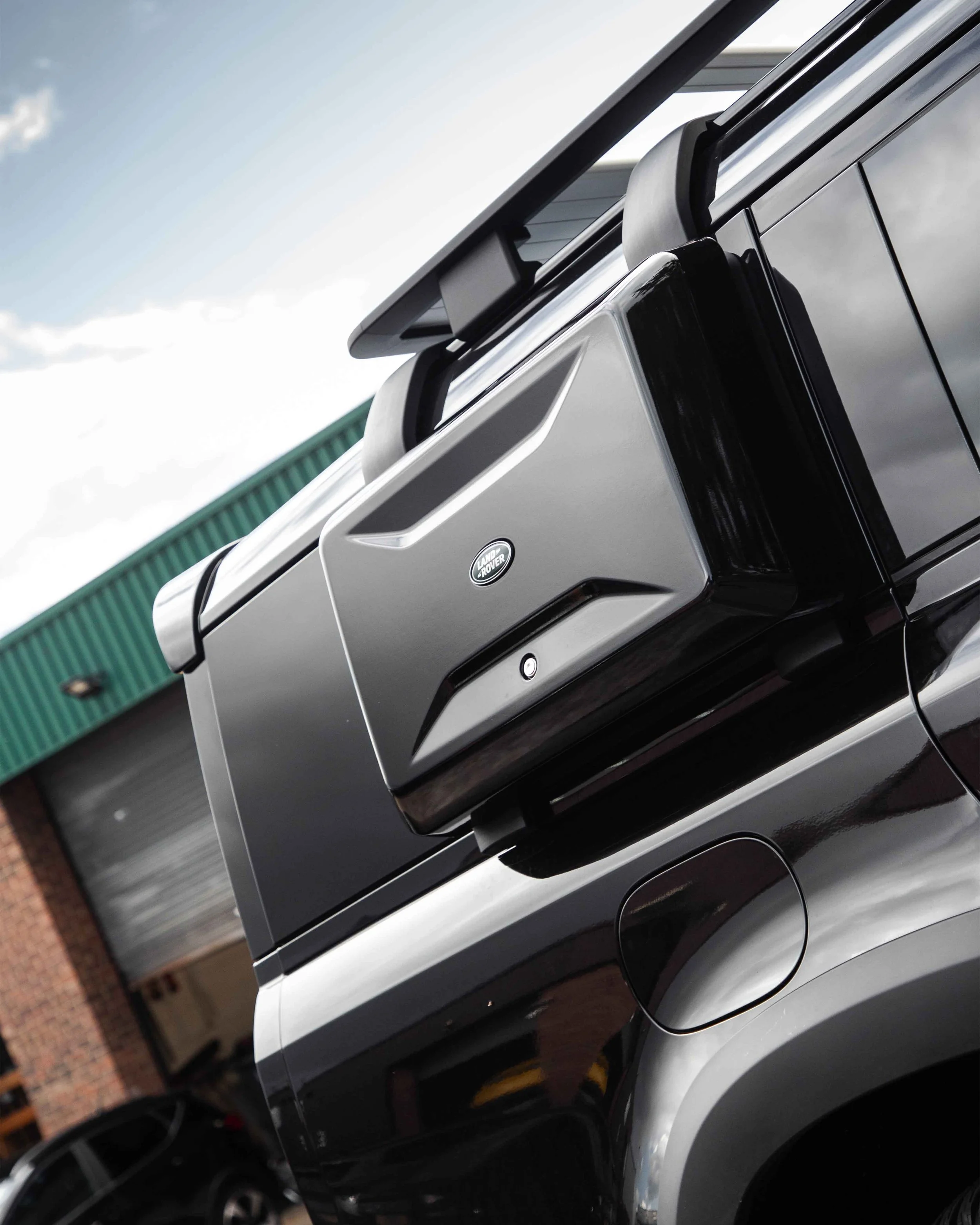 Land Rover Defender side box wrap in 3M 2080 Gloss Black