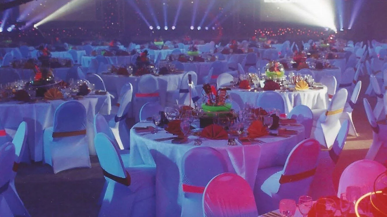 ballroom set for event with neon accents and lighting effects