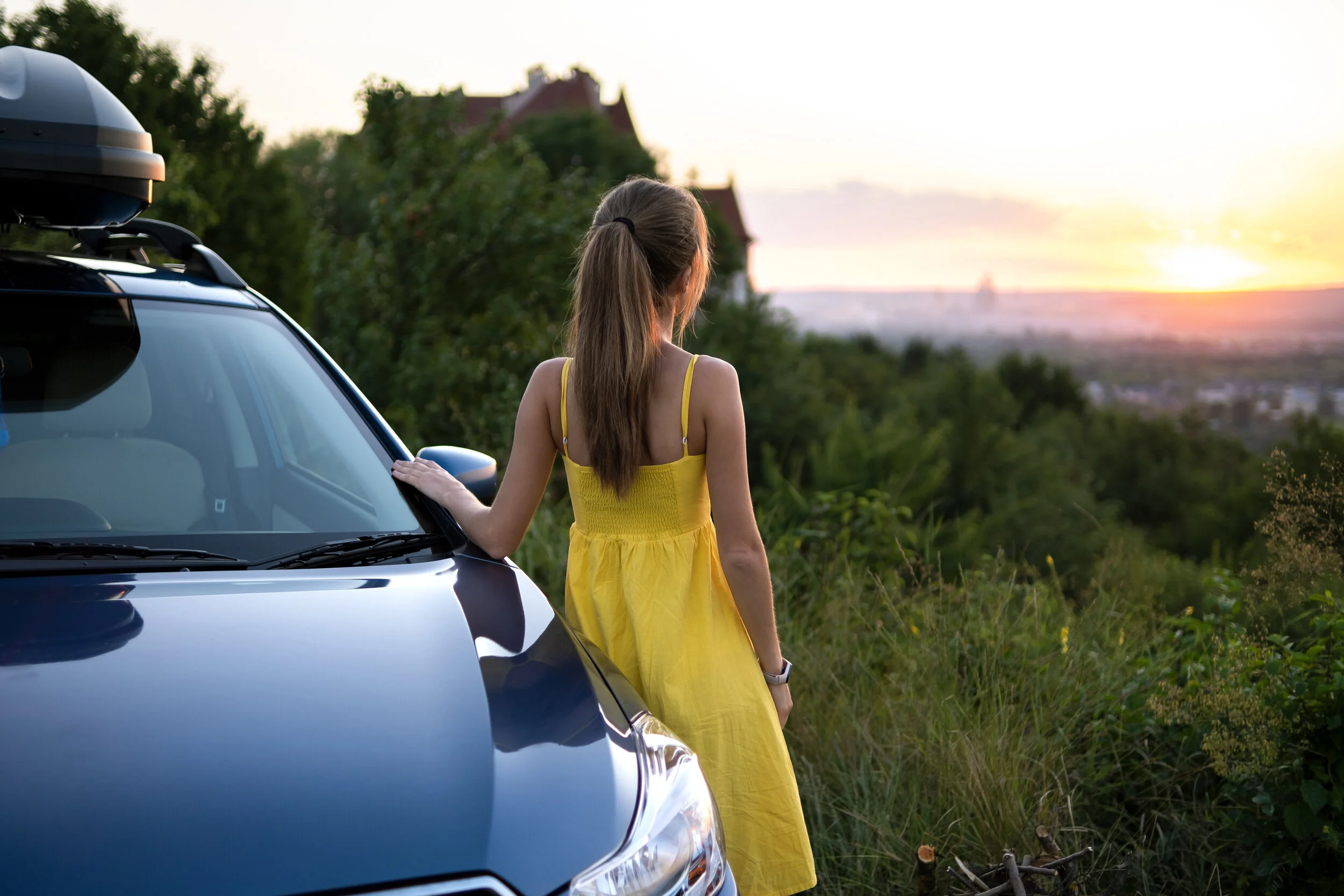 Female by Car Overlooking City_flipped_423930383.jpg