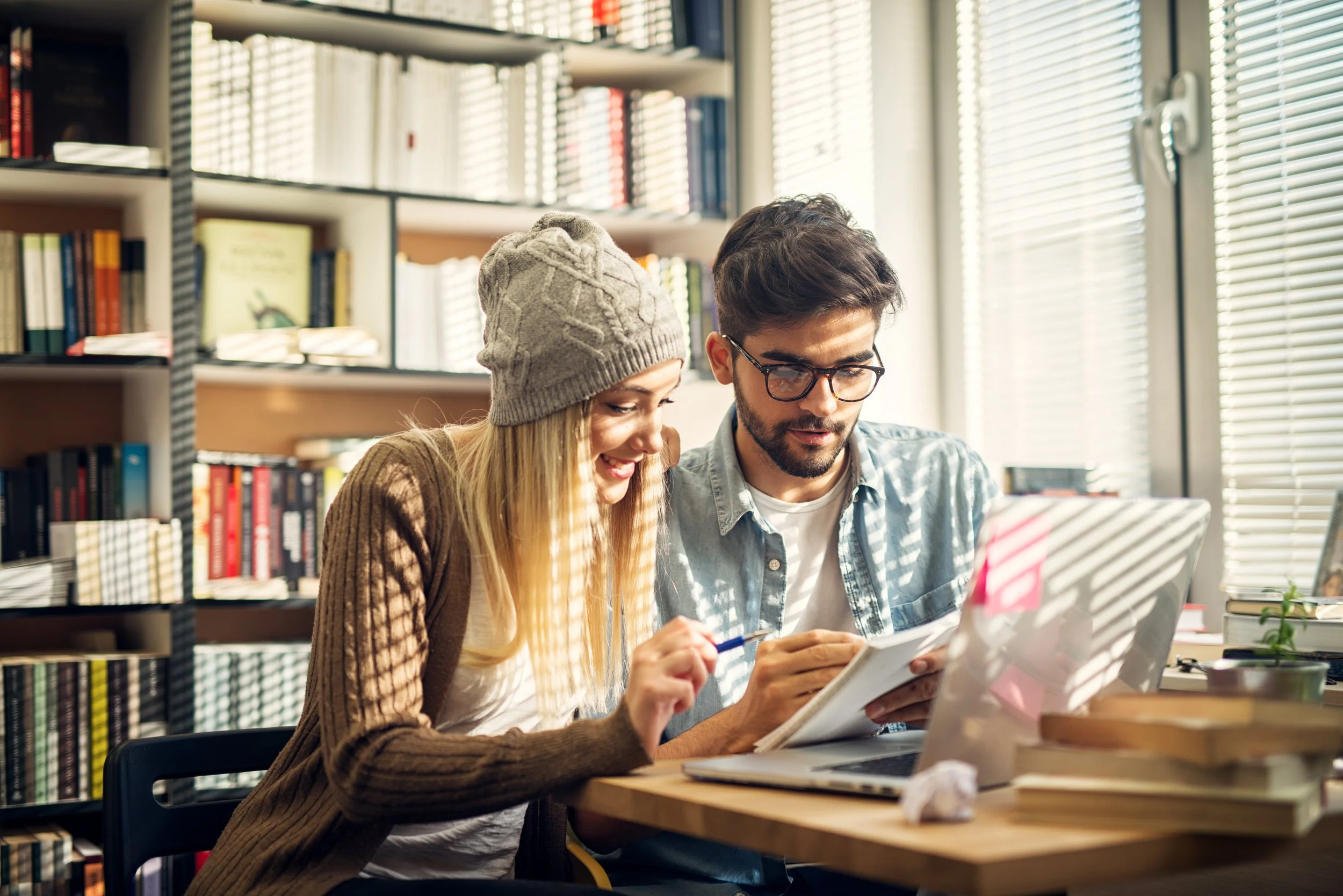 Young Couple Studying in Library_222997522.jpeg