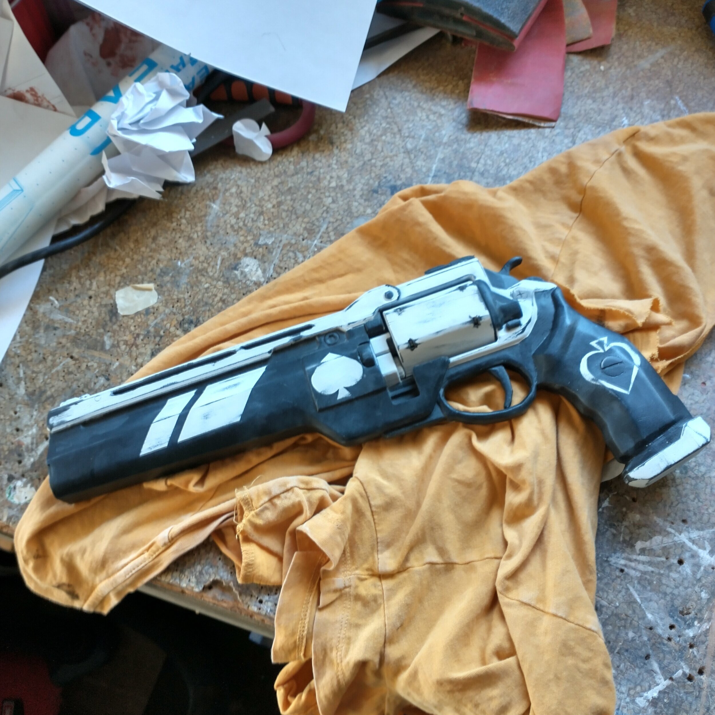 The Ace of Spades from Destiny 2. I 3D printed it on my modded Ender 3 in smaller parts, and then coated it with Bondo and masked and painted it. A layered paint job combined with some light sandpaper application produces a weathering effect.