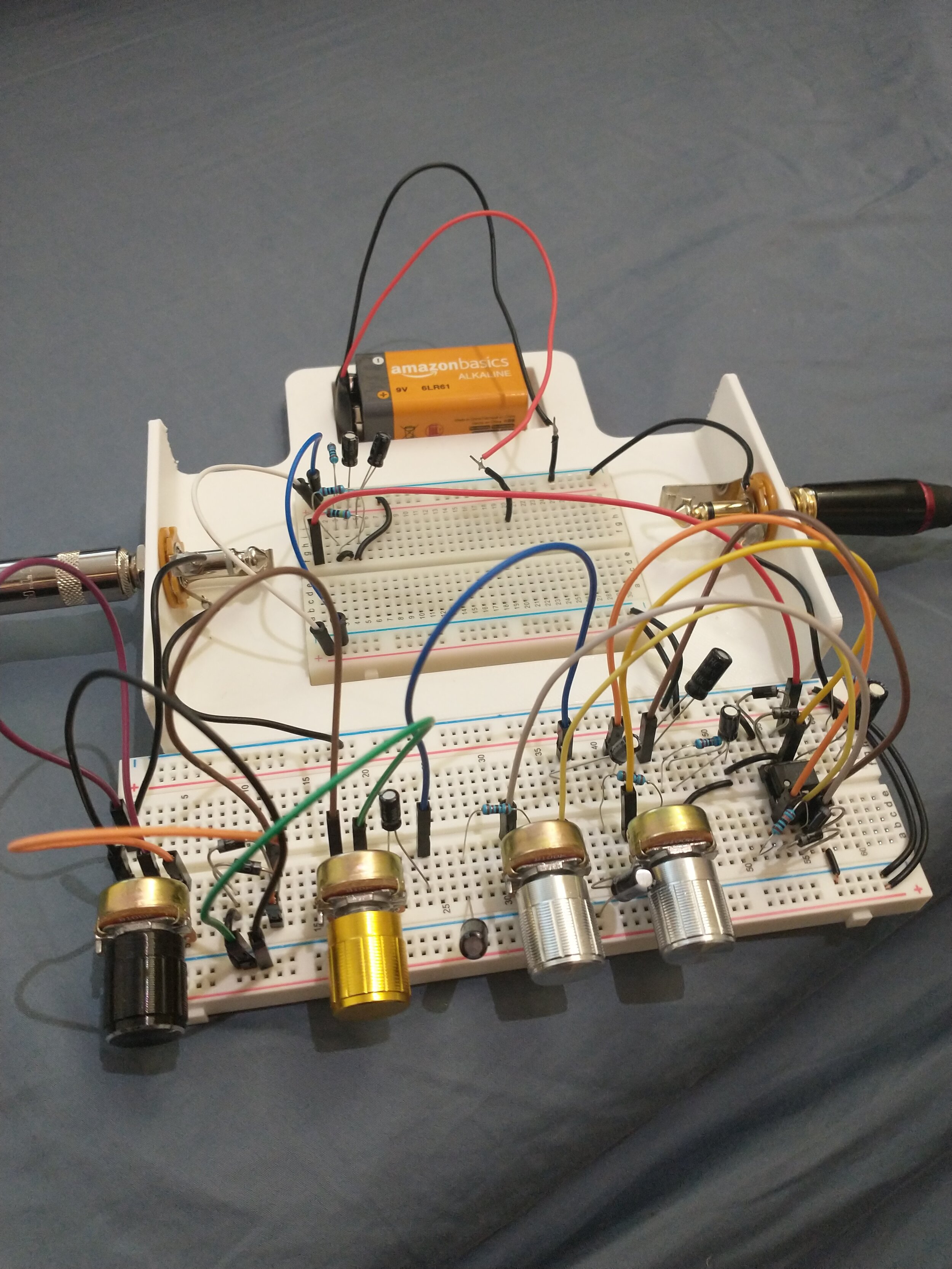 A simple overdrive guitar pedal circuit I designed with a volume, gain, and two tone control knobs.