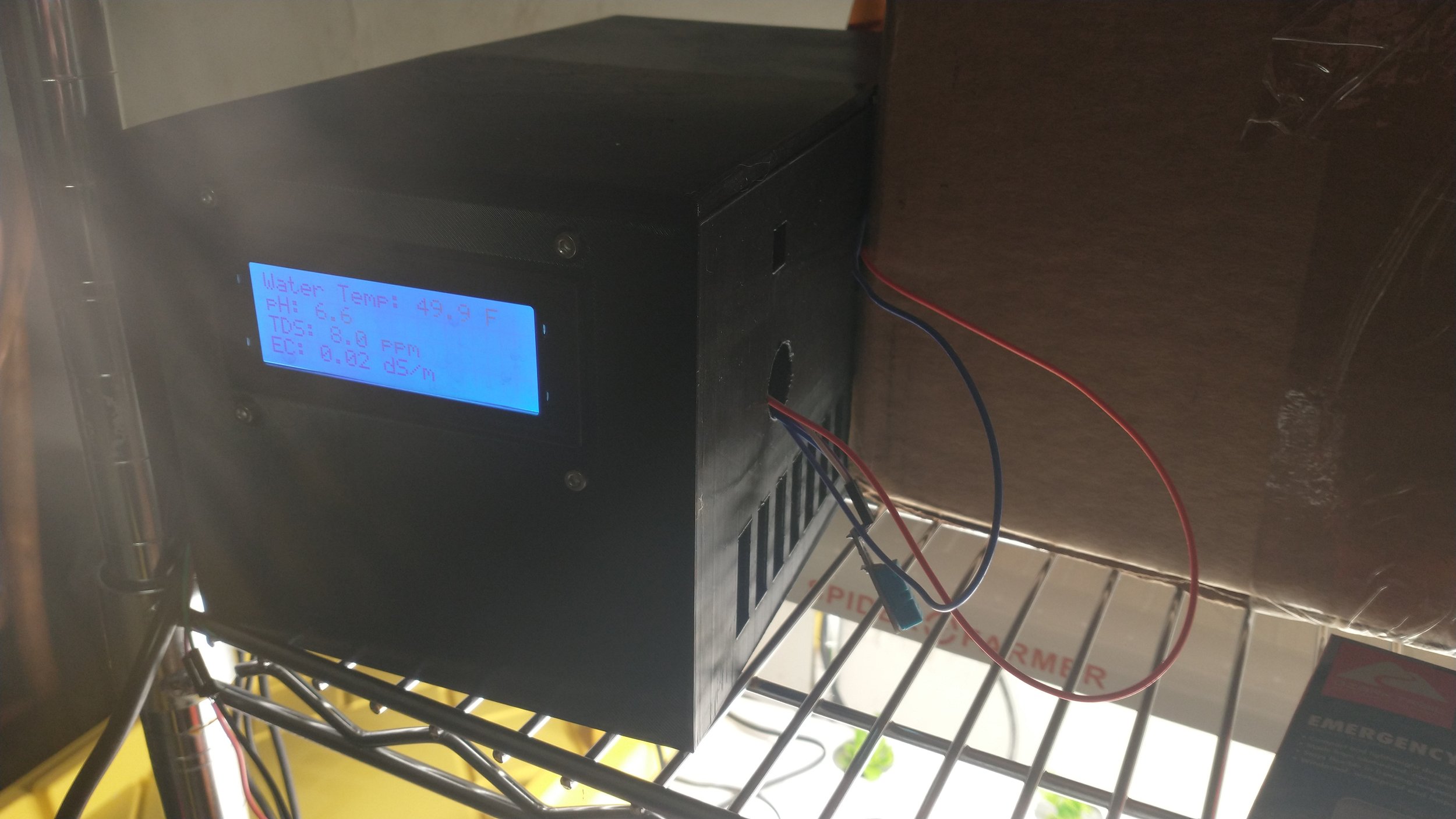 The Arduino system enclosure houses a 24V power supply for fans and pumps, as well as an Arduino, LCD, and breadboard to connect all the sensors and pumps to the Arduino. This system can measure water/air temp, humidity, nutrient concentration, and p