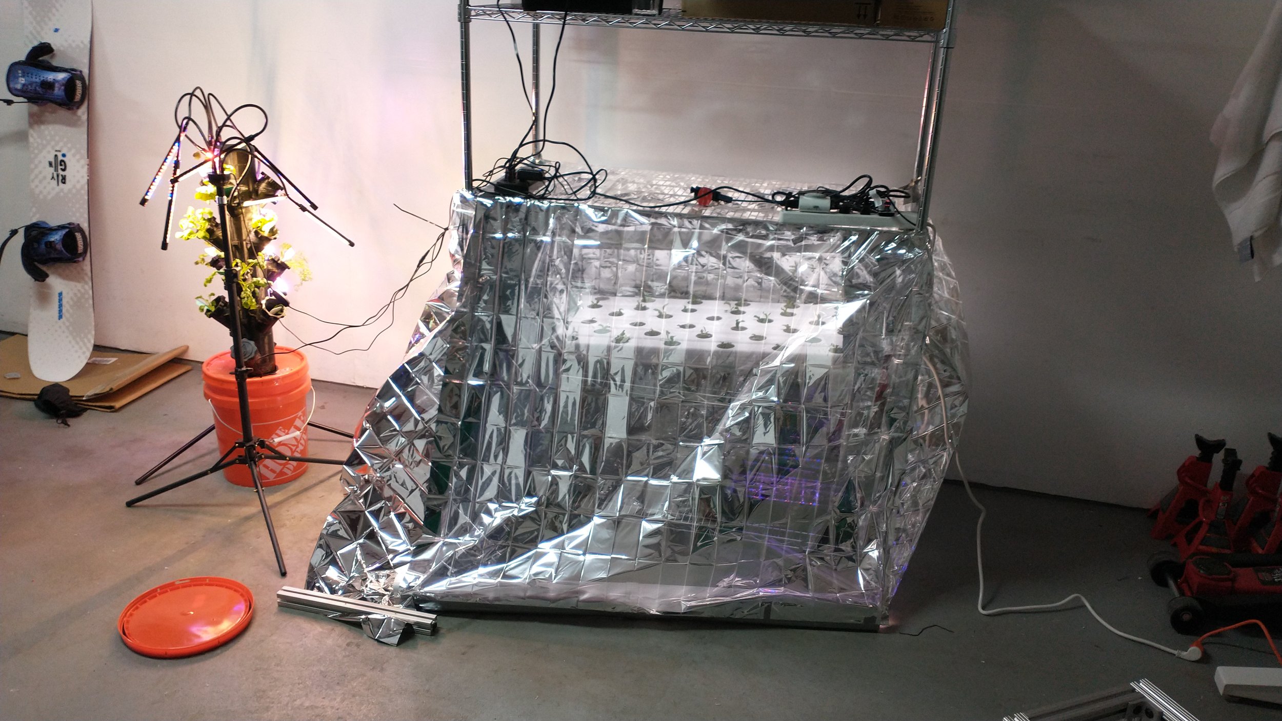 The system on the right is insulated with space blankets to keep heat and humidity in when the garage gets too cold.