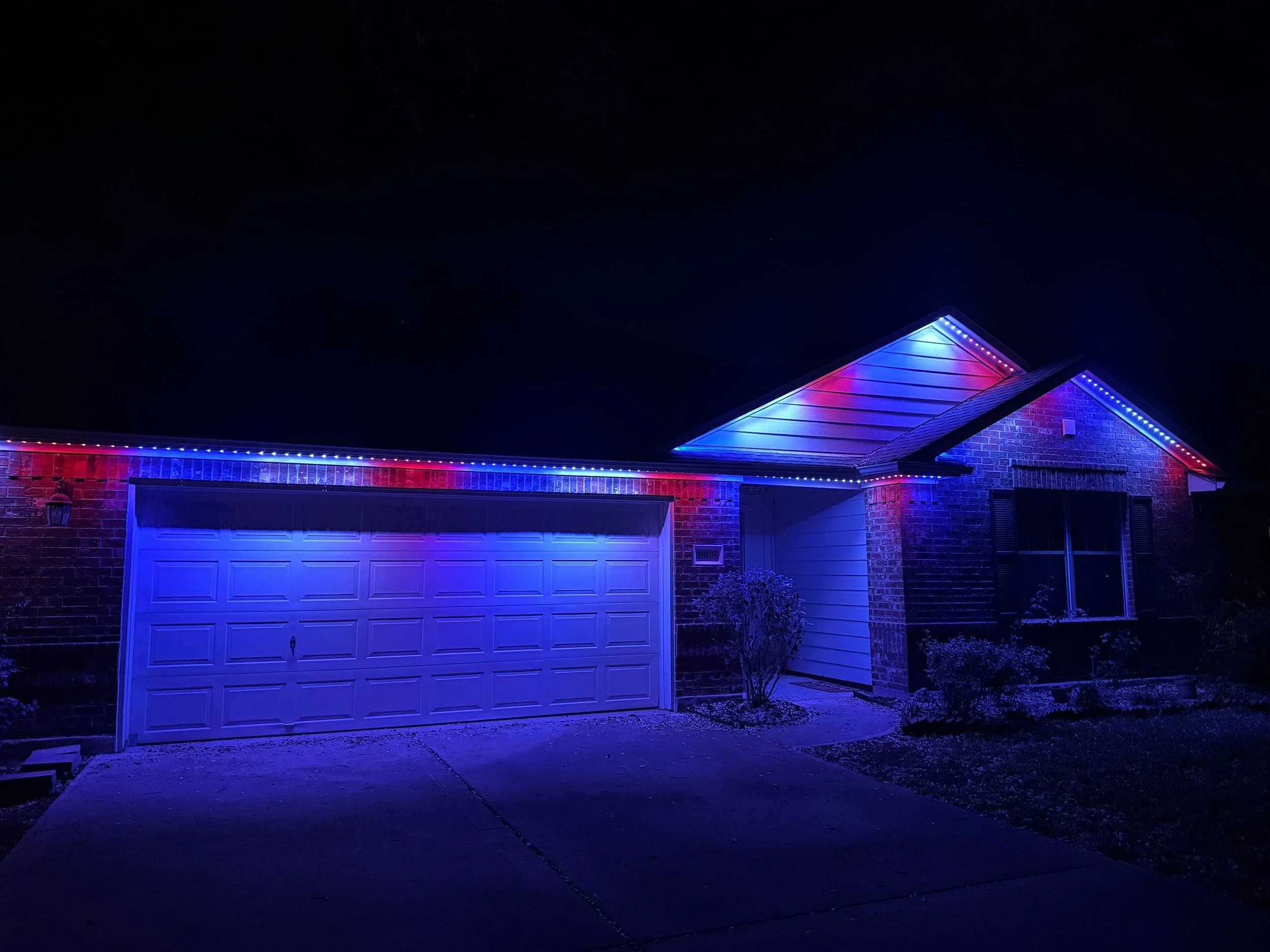 Red White and Blue LED Permanent Light Install from Oakwood Roofing & Construction
