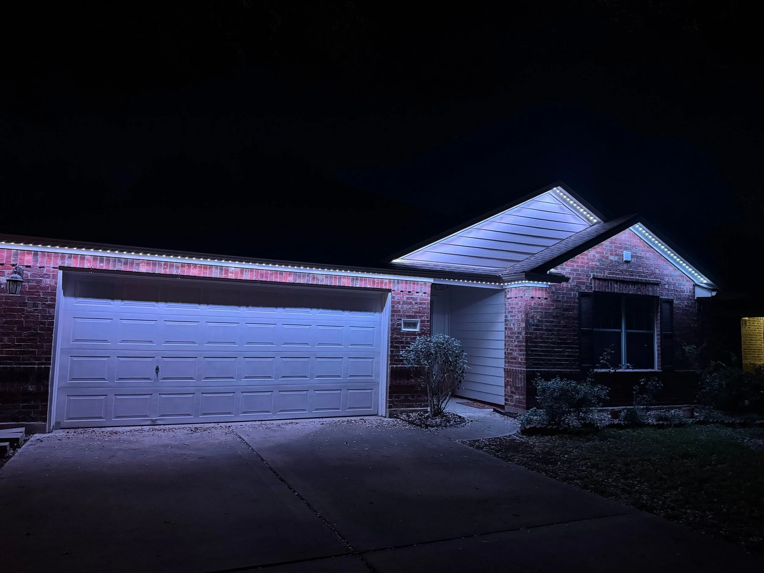 White LED Permanent Light Install from Oakwood Roofing & Construction