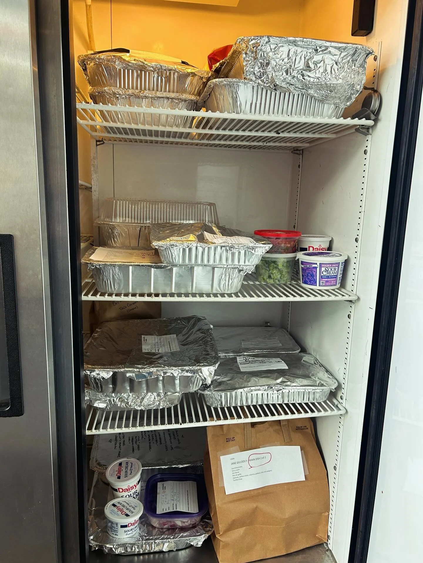 Amidst the disgraceful refusal of the current administration to release SNAP funding during the government shutdown, we are inspired - as always - by the quiet consistency of our 850+ volunteer cooks. This is a picture of our Drop-Off Space earlier t