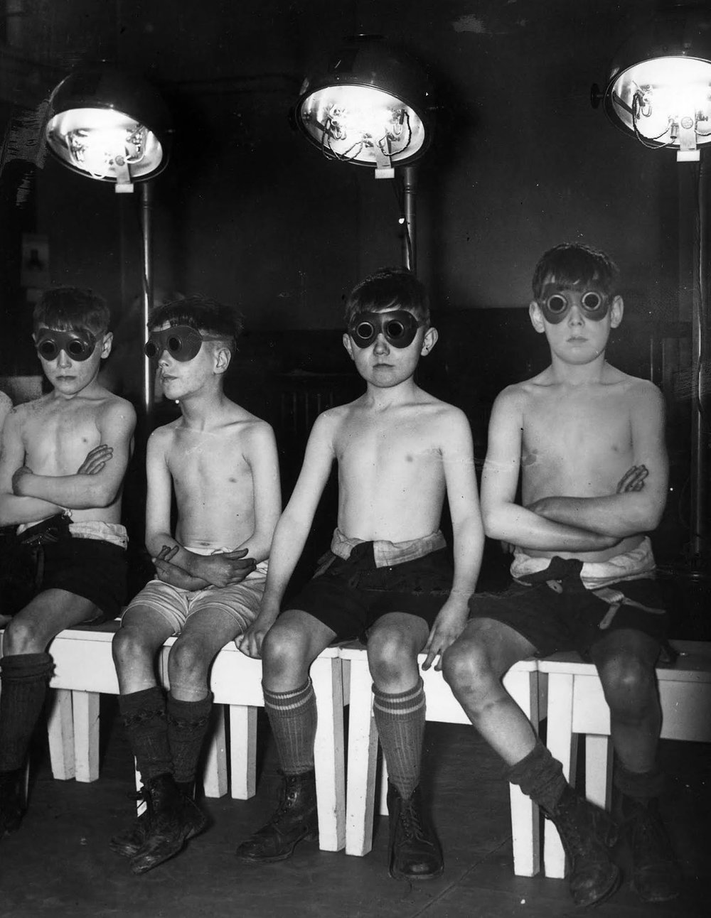  Children undergoing sunray treatment at Manchester’s Open Air School for Delicate Children. 1939. 