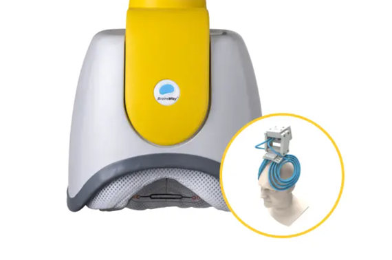 A large white and yellow TMS helmet, and a smaller inset image of a head with a blue magnetic coil positioned on the head, indicating the position of the TMS coil in the helmet.