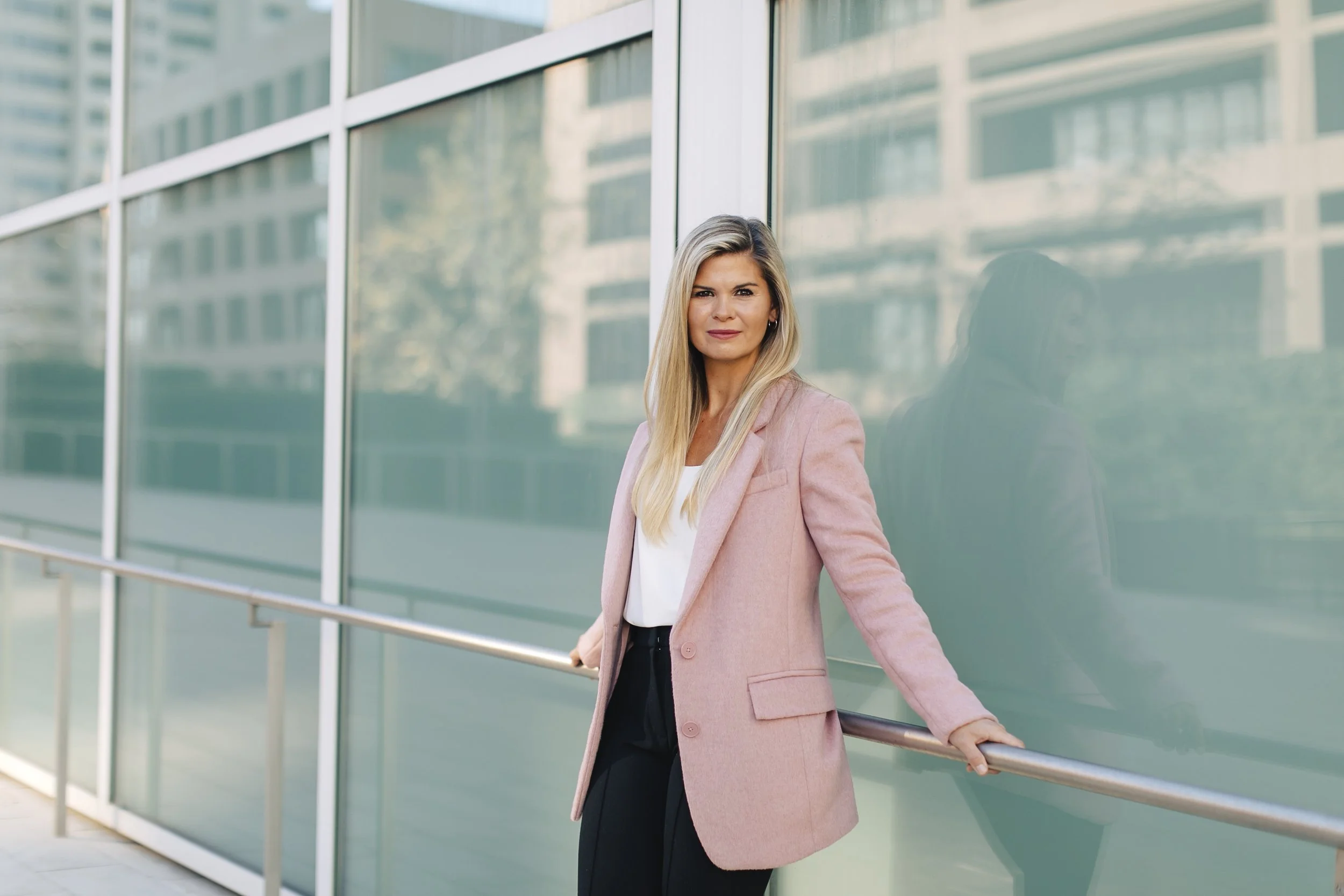 Career Coach, Kate Rosenberg, standing outside office building