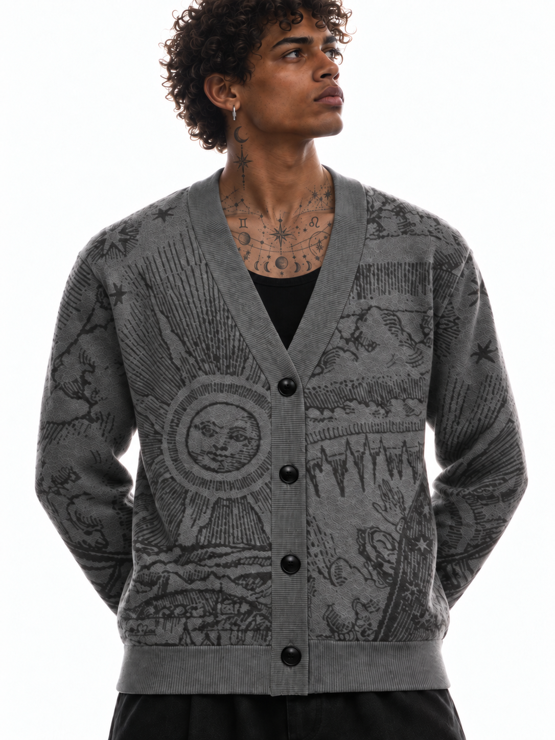Ribbed V-neck of The Anderson cardigan with astrological chest and neck tattoos visible