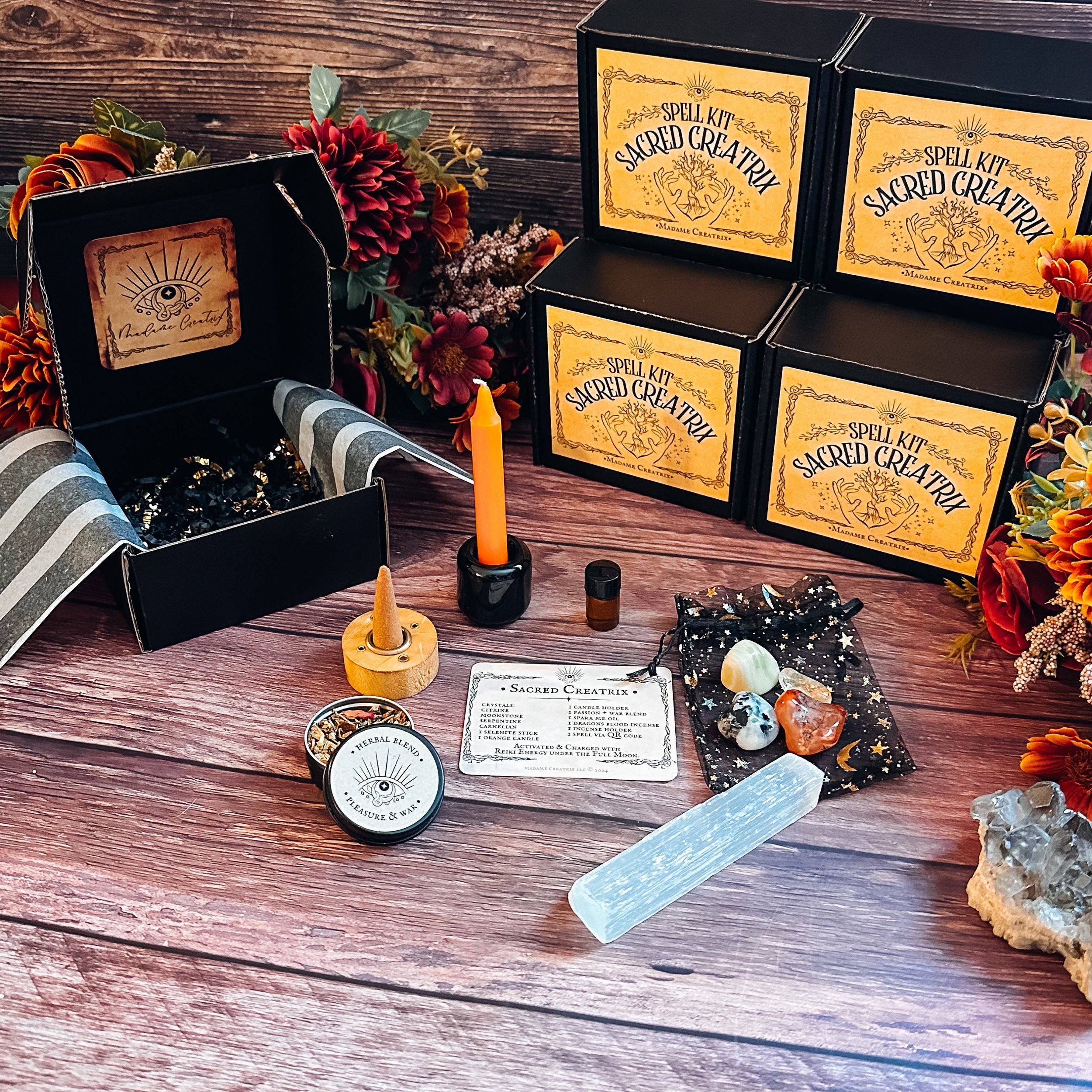 Orange chime candle with holder and Spark Me oil, ready for ritual use in your Sacred Creatrix Rituals..