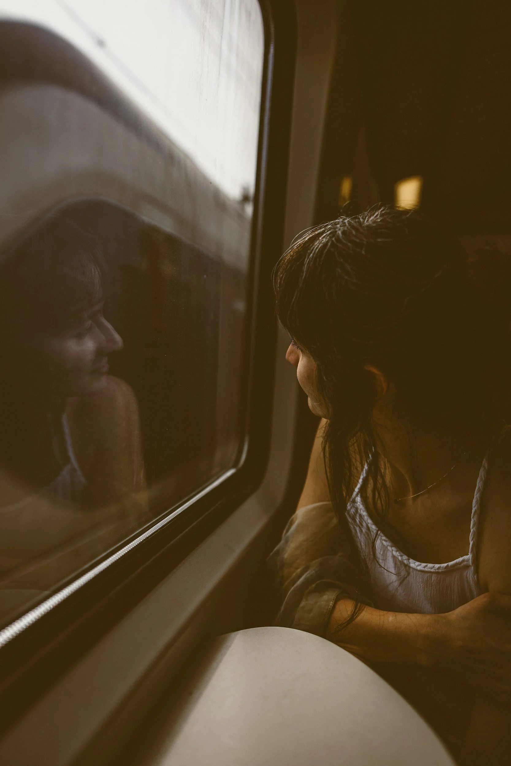 Woman in peaceful moment of reflection - therapy for relationship anxiety and people-pleasing