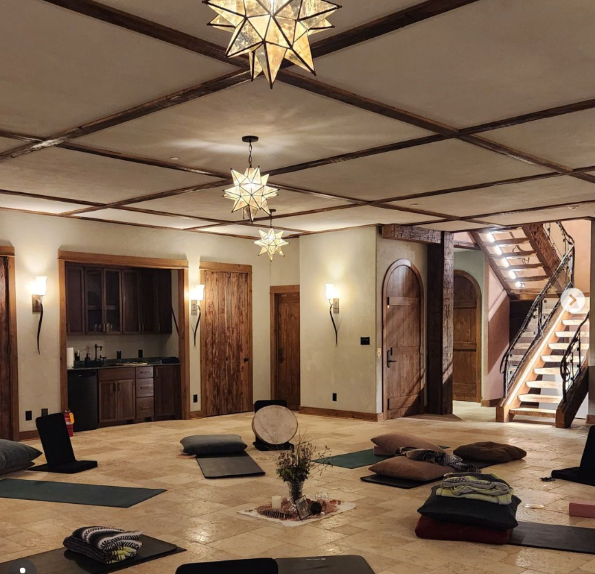 Breathwork mats set up in the basement of Valaterra.