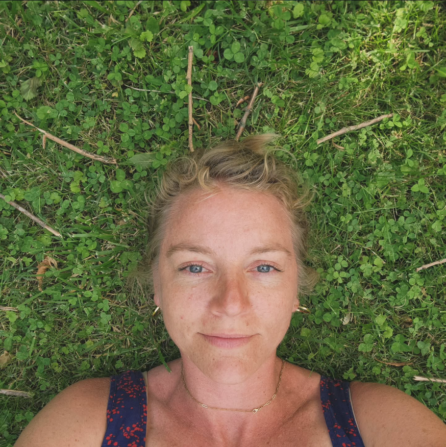 Nicole selfie laying on the ground