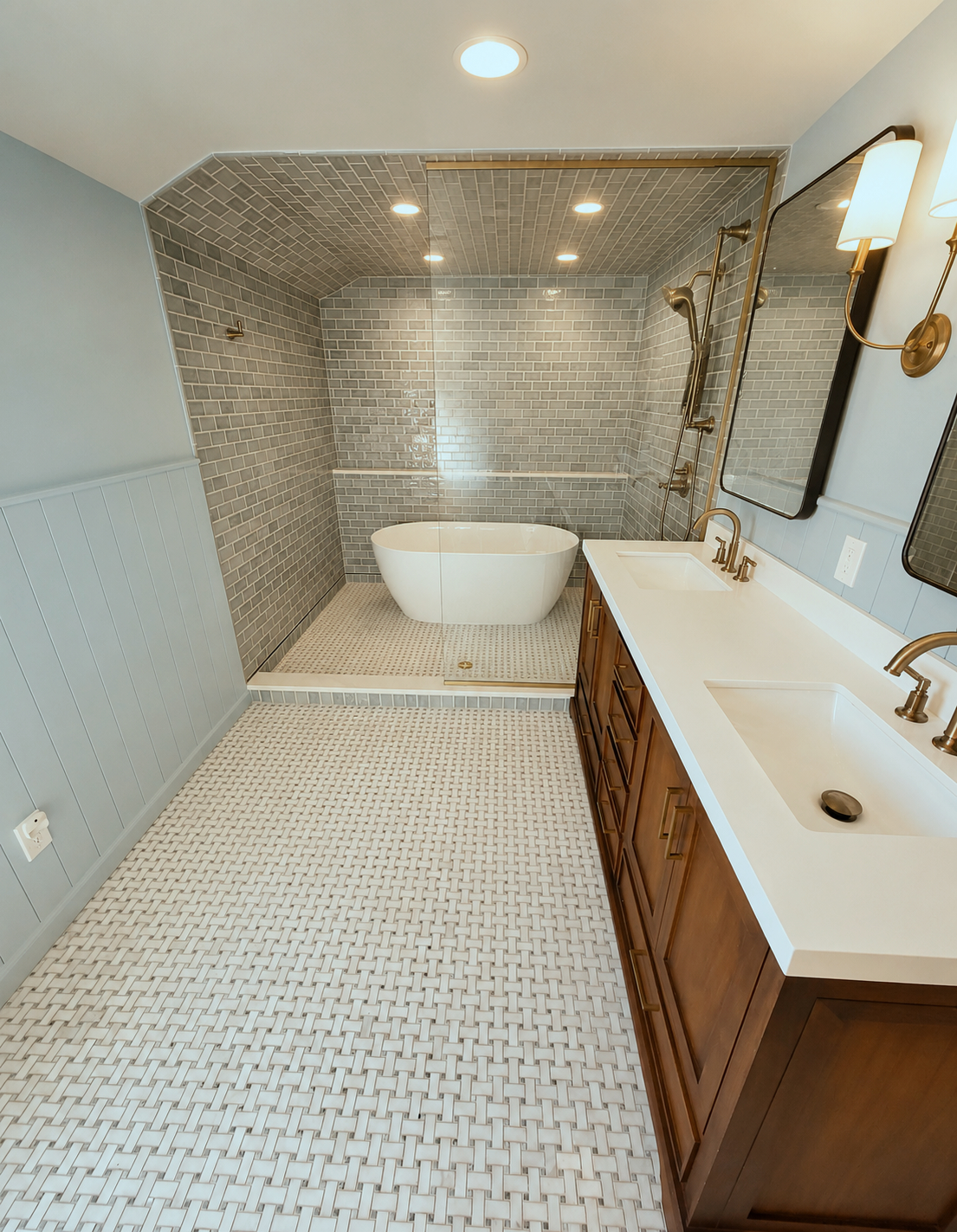 An expanded footprint allows for a full wet room and a double vanity.