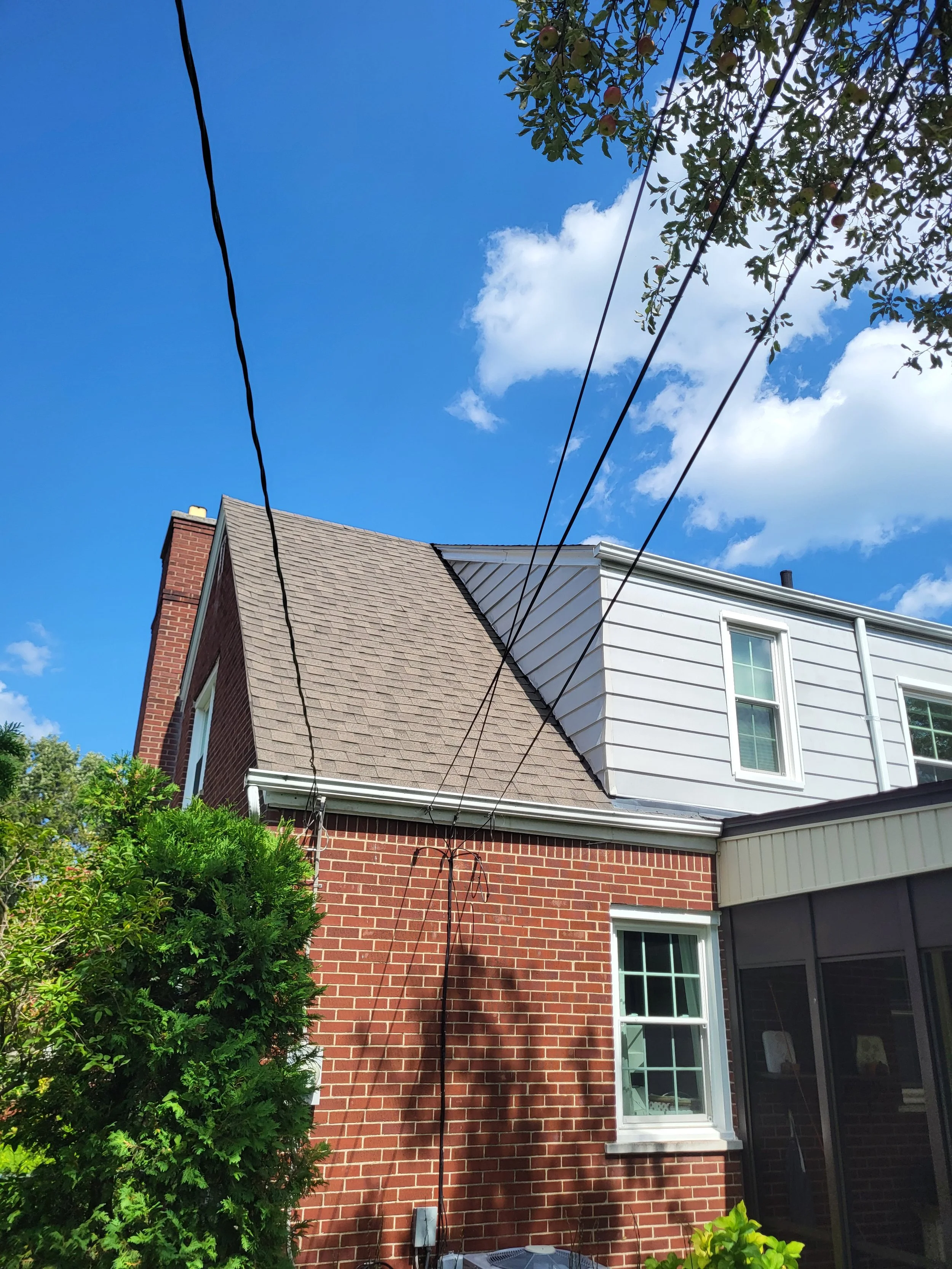 Small dormer on the back of a house before it was expanded.