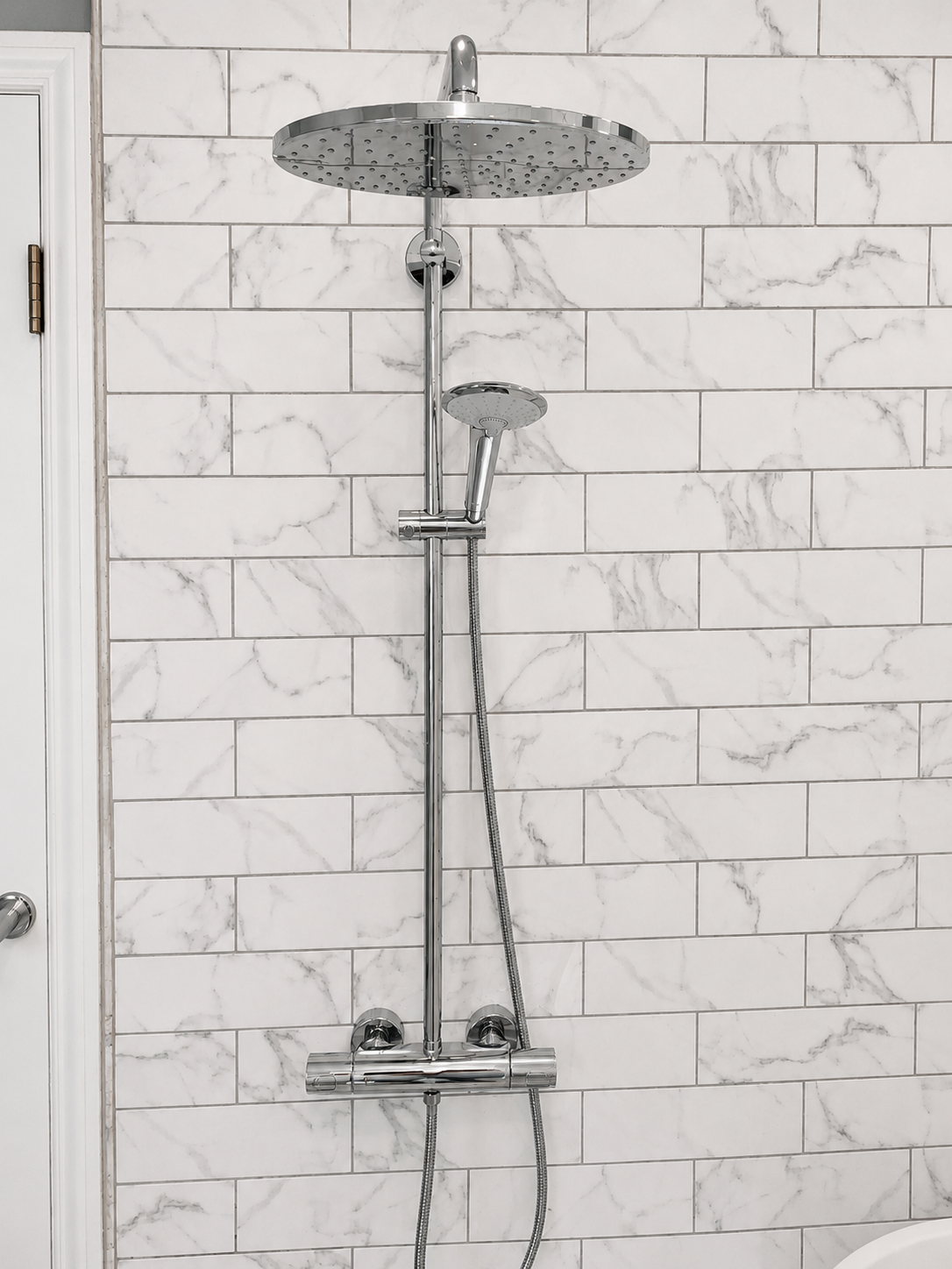 Rainfall shower head with handheld shower head