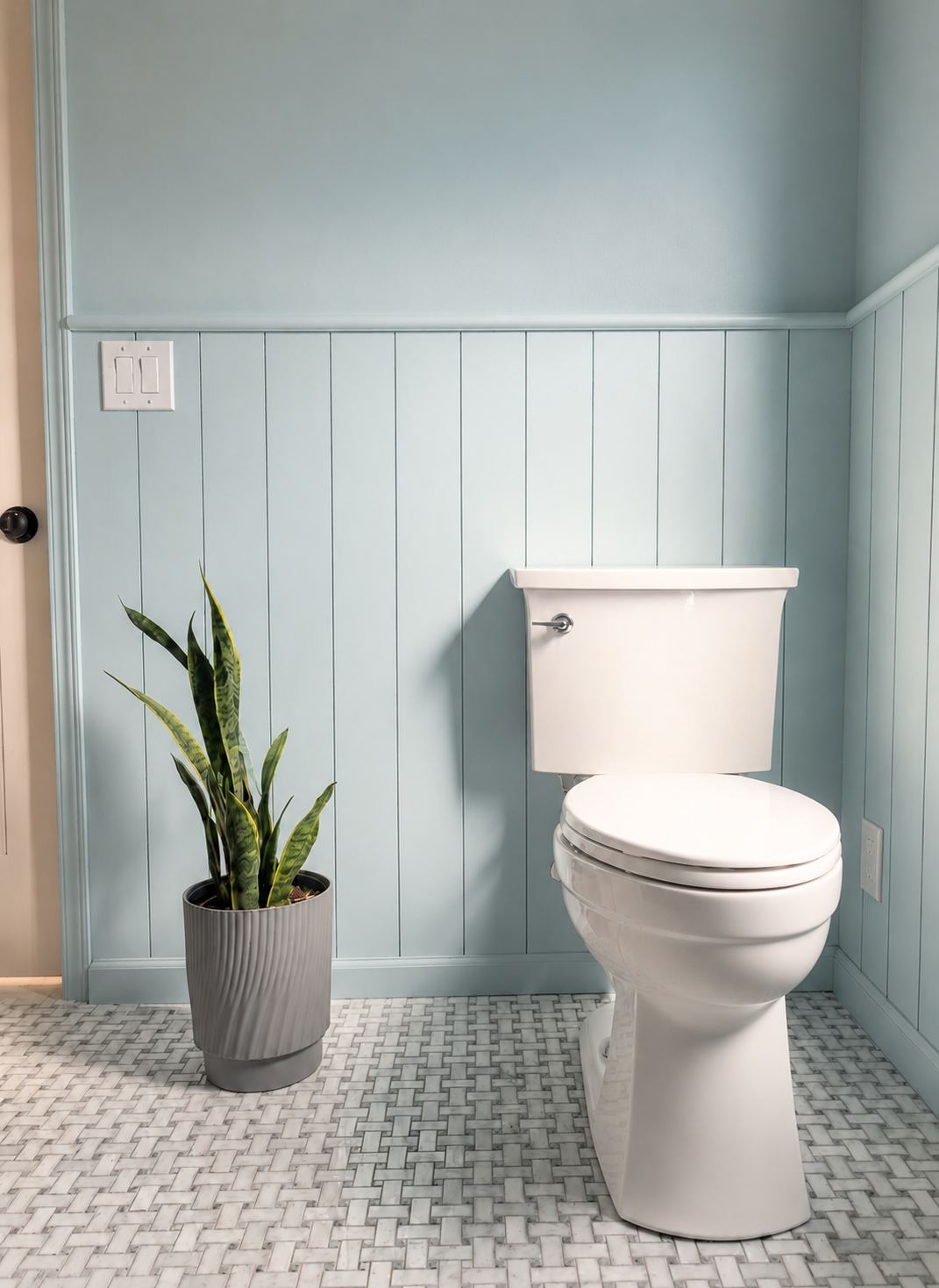 A spacious toilet clearance with room for decorations and adornments.