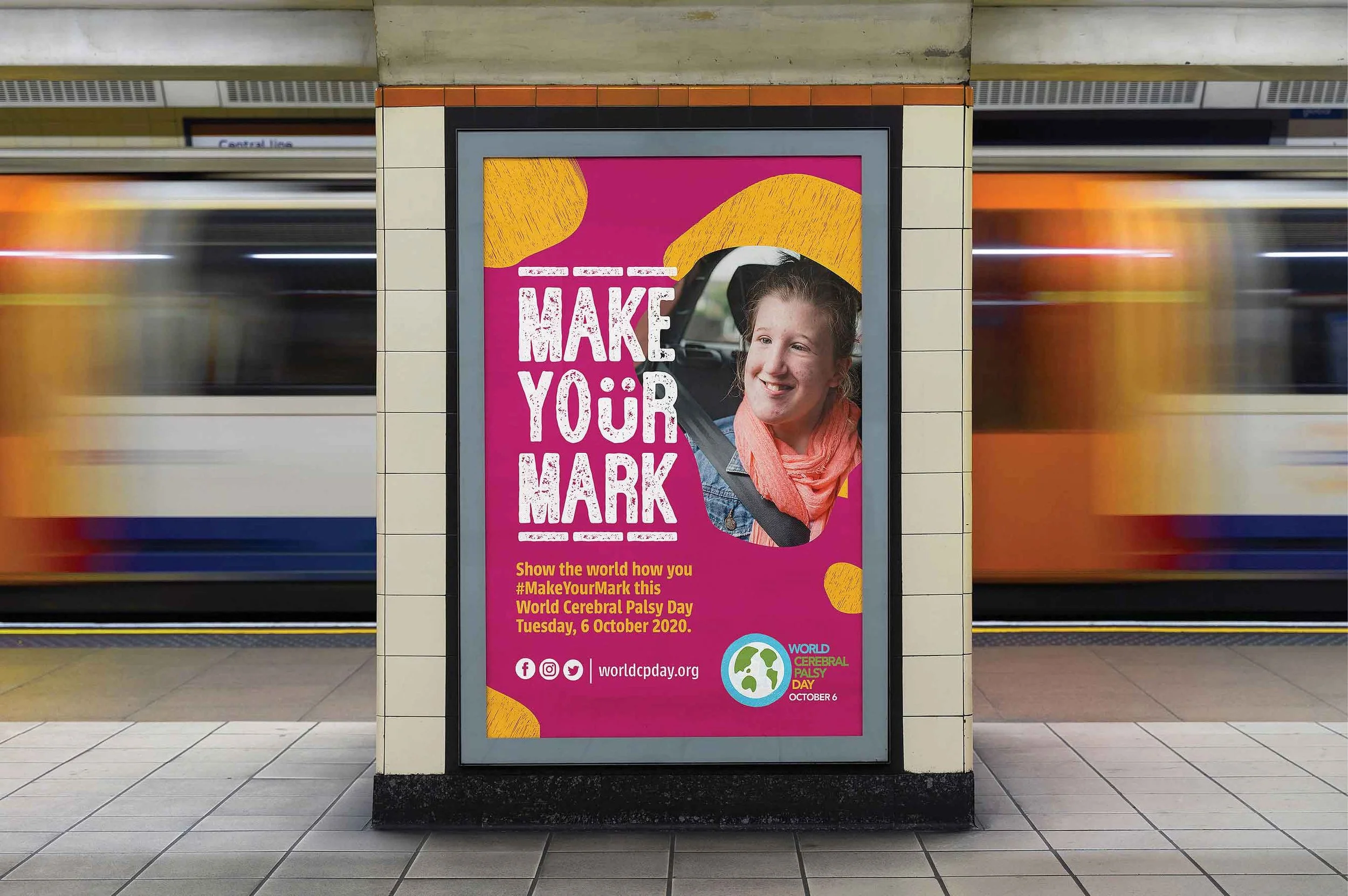 Advertisement poster at a subway station promoting World Cerebral Palsy Day on October 6, 2020, featuring a smiling young woman looking out of a train window with a pink background, bold white text saying 'MAKE YOUR MARK,' and a colorful logo of a br