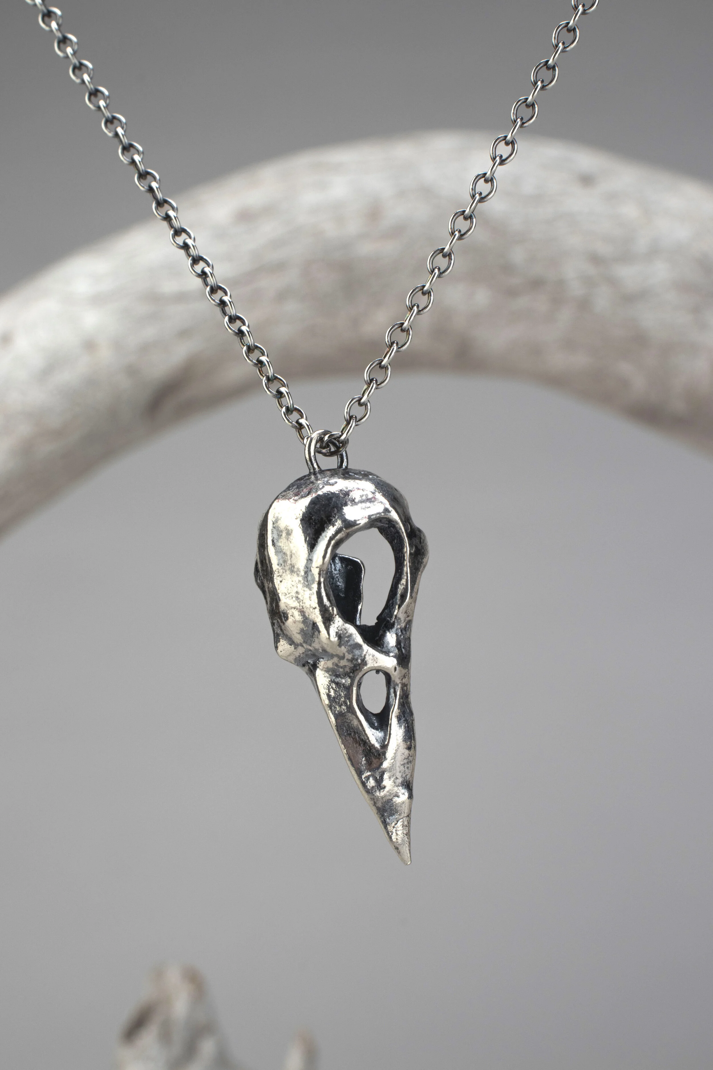 Raven Haven Pendant:

Two cultures view these beautiful, and mysterious black birds entirely differently. Native North Americans have seen ravens as bringers of light and are the foundation of their creation stories. In many European cultures, they a