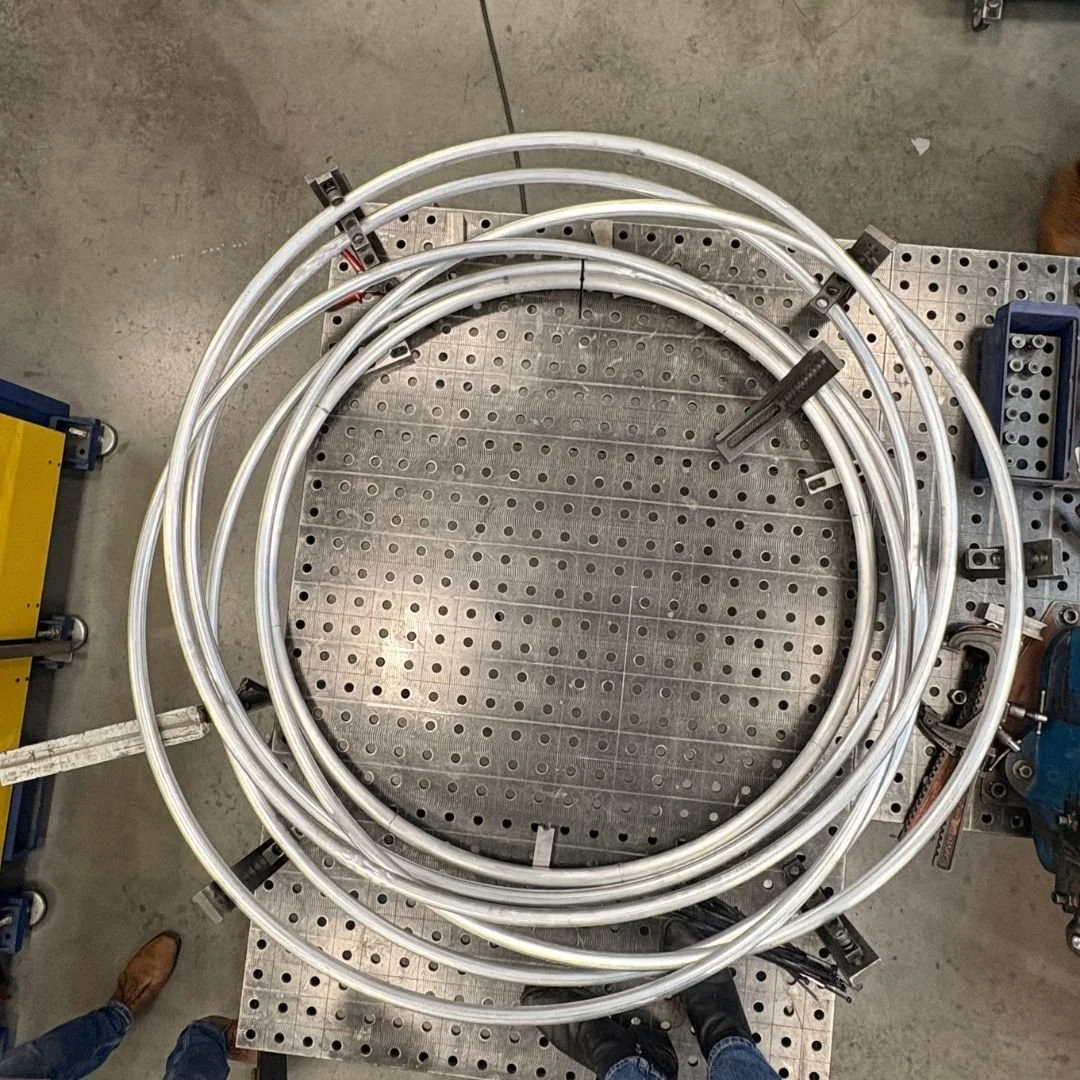 One of our projects features two completely bespoke light fittings designed to reflect their logo (can you guess who?!).

We have been working with the fabulous lighting designers Dash Dash Dot to conceive, prototype and test. These are a few shots o