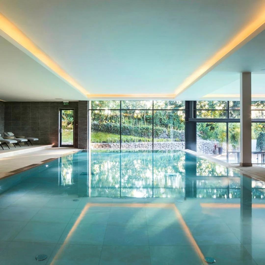 Gaia Spa at Boringdon Hall.

A project centred around atmosphere &mdash; creating a space that feels calm, immersive, and considered from the moment you step in.

Working within a historic setting, the focus was on layering materials, light and textu