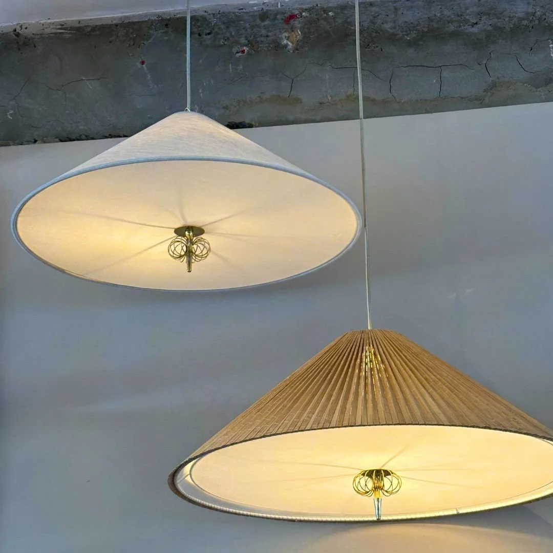 Lighting is something we consider early on, as part of the overall concept &mdash; because of the impact it has on how a space feels to use day to day.

These pendants are designed with a diffused base, softening the light and avoiding harsh glare wh