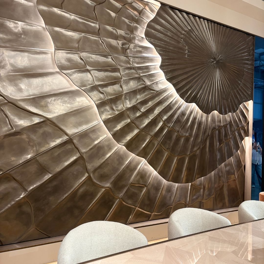 Luxury doesn&rsquo;t always need to come from adding more to a room. Sometimes the building itself can become the artwork.

Layered bronze wall panels like these, combined with carefully integrated lighting, bring depth, texture and changing reflecti