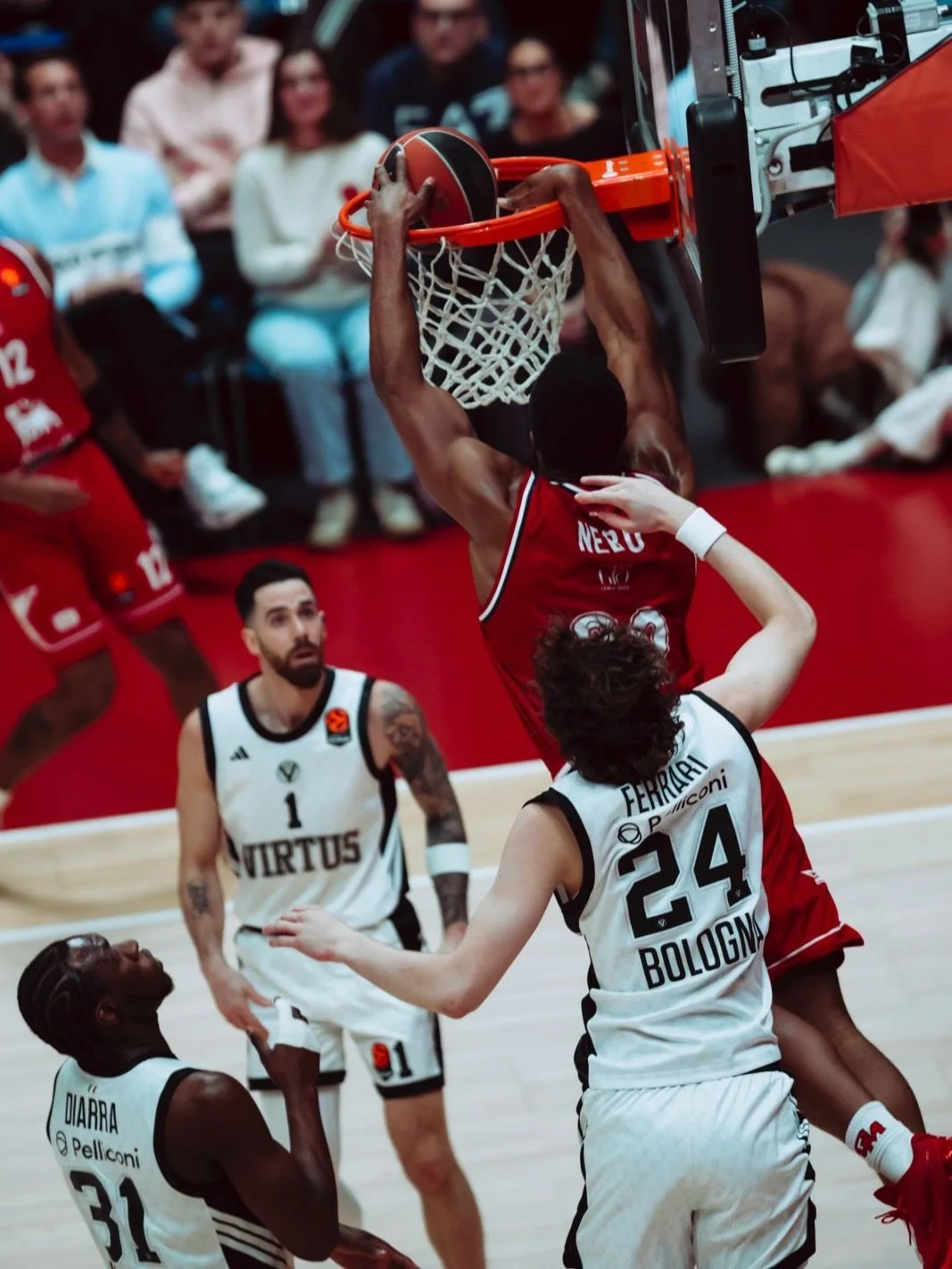 In Italy, they call it pallacanestro: a word inseparable from the way the Game has settled into the country over time, absorbing its rhythms and its demands. When @olimpiamilano1936 meets @virtusbologna, that inheritance becomes immediate. It lives i