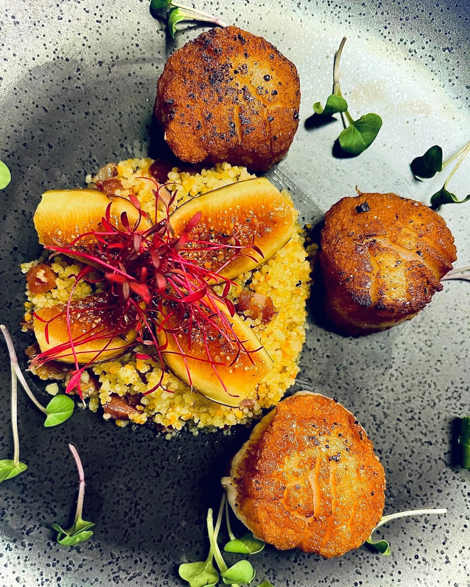 This week&rsquo;s scallops from Sam Rust Seafood are pure indulgence&mdash;perfectly seared, golden and tender, paired with savory couscous cooked with prosciutto and a sprinkle of thyme and lemon zest.

We finish with a caramelized fig kissed with b