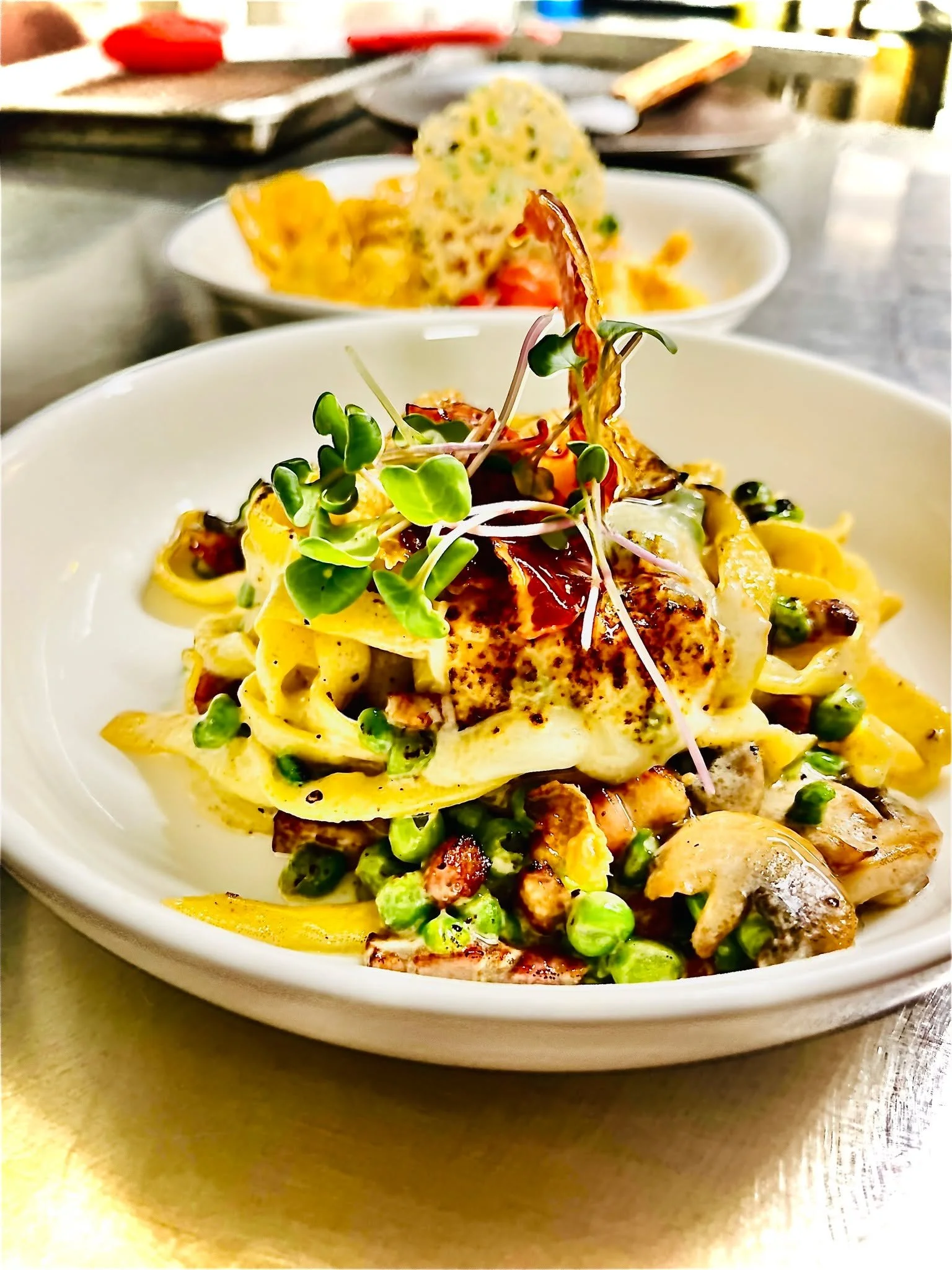 🍝✨ Warning: this pasta dish may cause cravings ✨🍝
It is the flavor combination you ask us to bring back&mdash;again and again. 

Our handmade fettuccine, cooked al dente (as it should be), are tossed in a luscious sauce of pancetta, peas, mushrooms