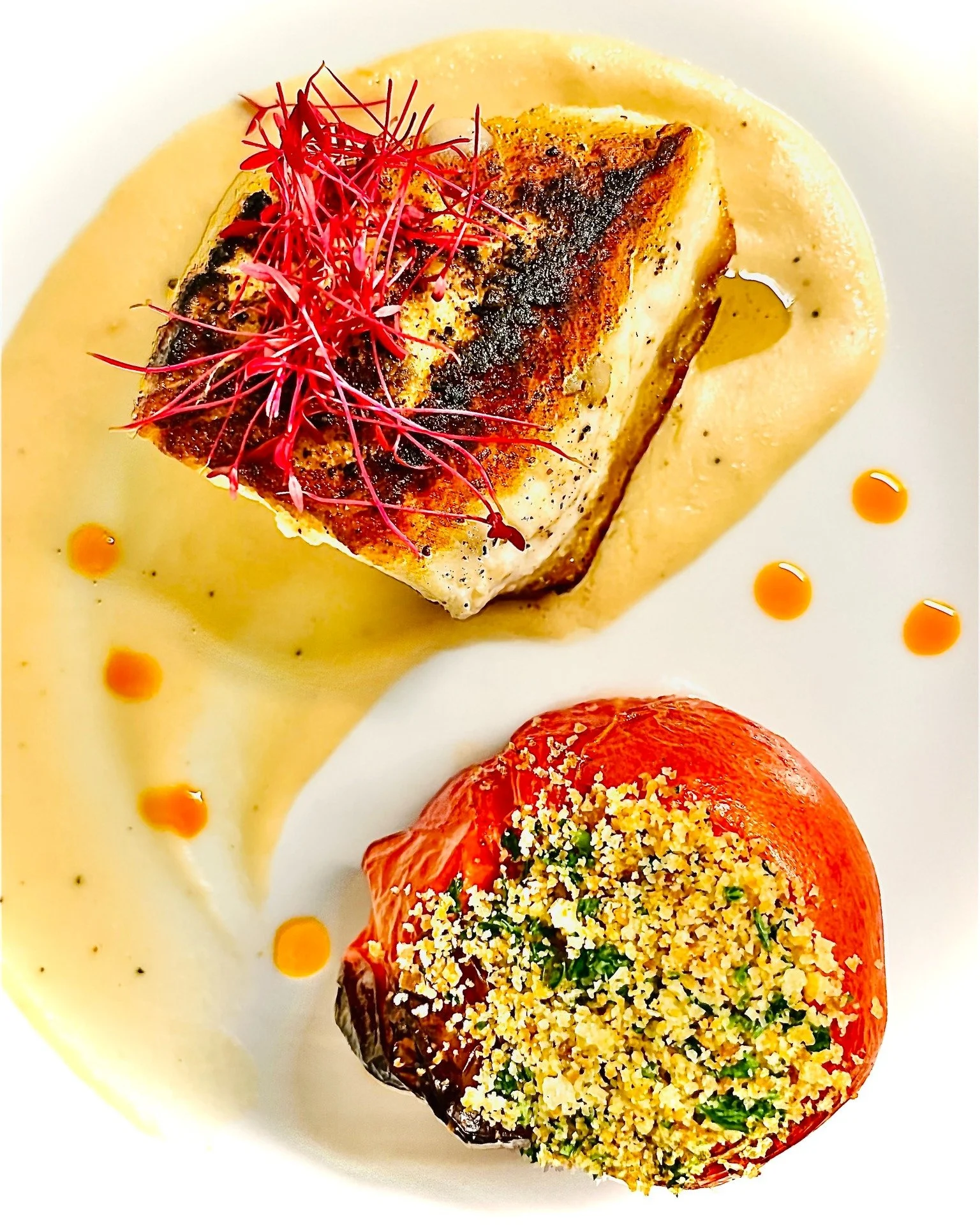 🐟✨ Elegance on the plate. ✨🐟

This week&rsquo;s halibut from Sam Rust Seafood is pan-seared to perfection&mdash;delicately crisped on the outside, tender and flaky within. It rests on a velvety cannellini bean pur&eacute;e, accompanied by roasted C