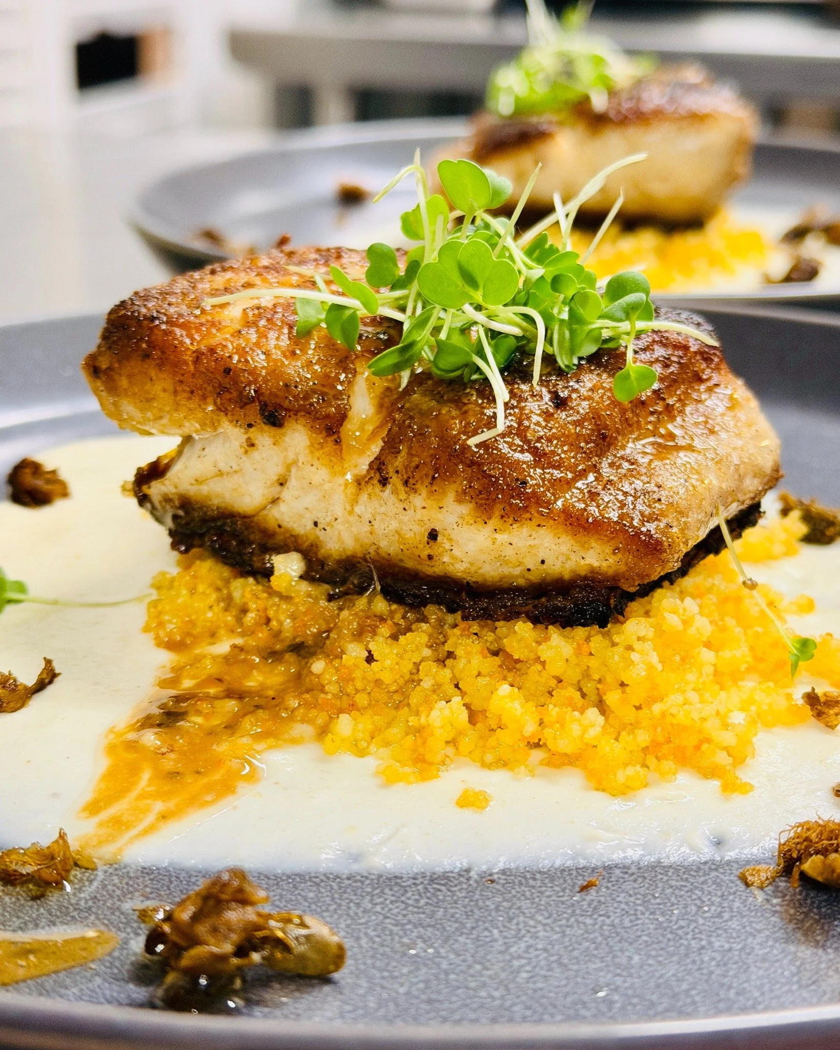 On our menu this week, pan-seared mahi fillet is paired with silky creamed cauliflower and delicate couscous. Anchovy butter melts gently into the fish, adding depth and quiet richness, while fried capers bring a crisp, briny lift to finish.

Deeply 