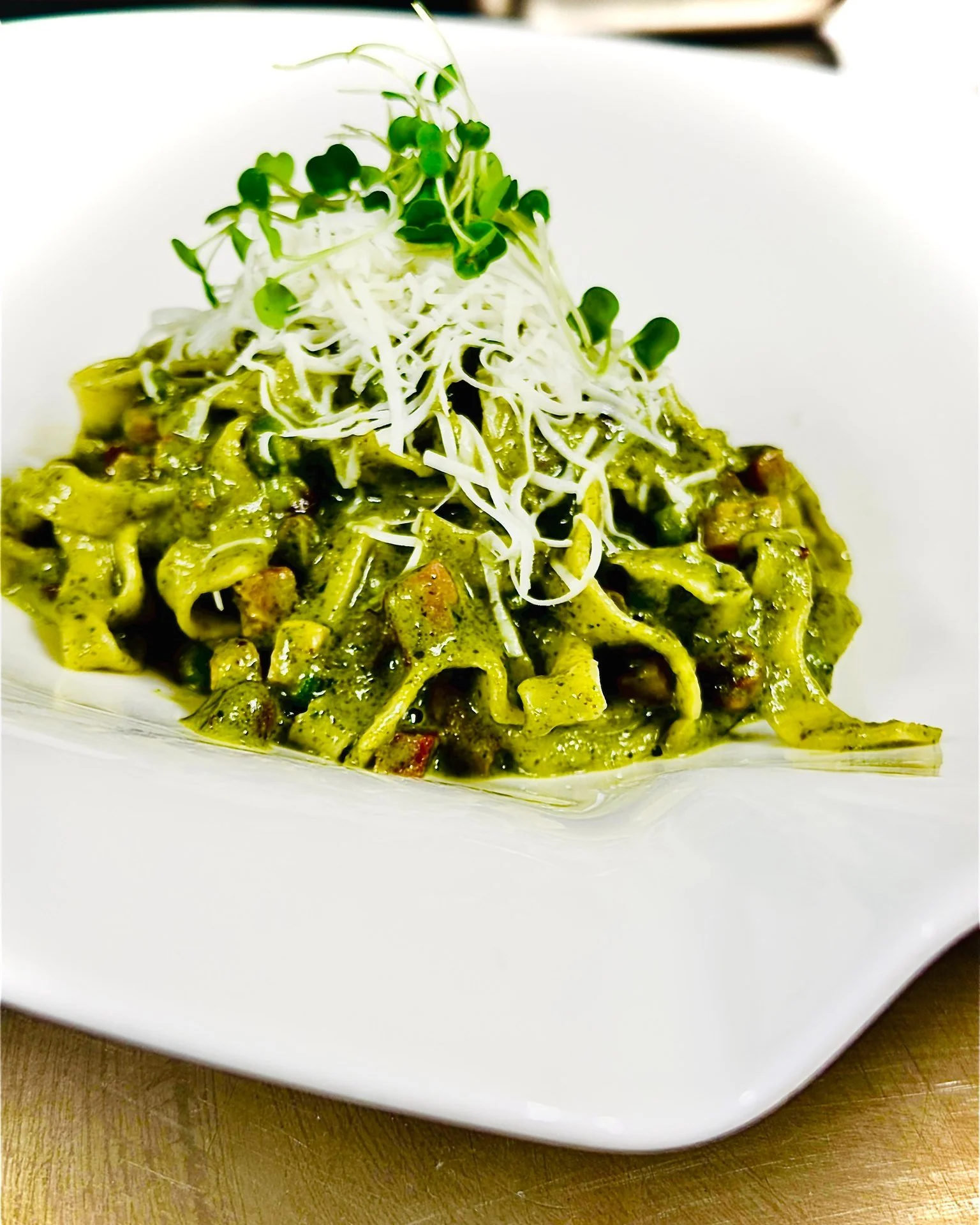 There&rsquo;s something about our fettuccine&hellip;

Handmade, cooked just to that perfect bite and this week dressed in a deep, velvety kale sauce&mdash;rich, green and full of flavor. Sweet peas bring a little brightness; crispy pancetta adds that