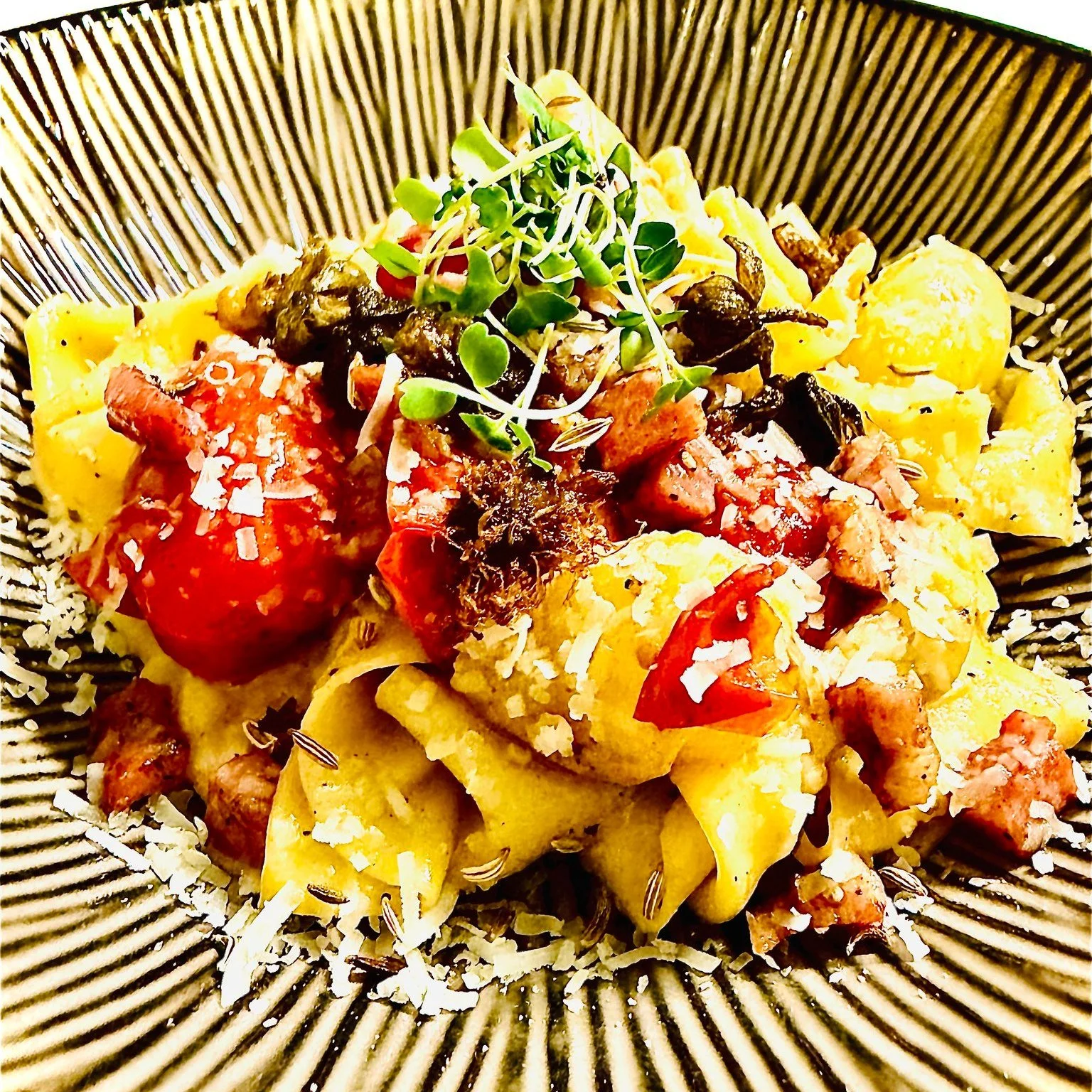 Some ingredients seem destined to find each other.

Tomatoes and garlic.
Butter and wine.
Pasta and Parmigiano.

This week's pappardelle bring them all together.

Long ribbons of house-made pasta cooked perfectly al dente and tossed with roasted cher