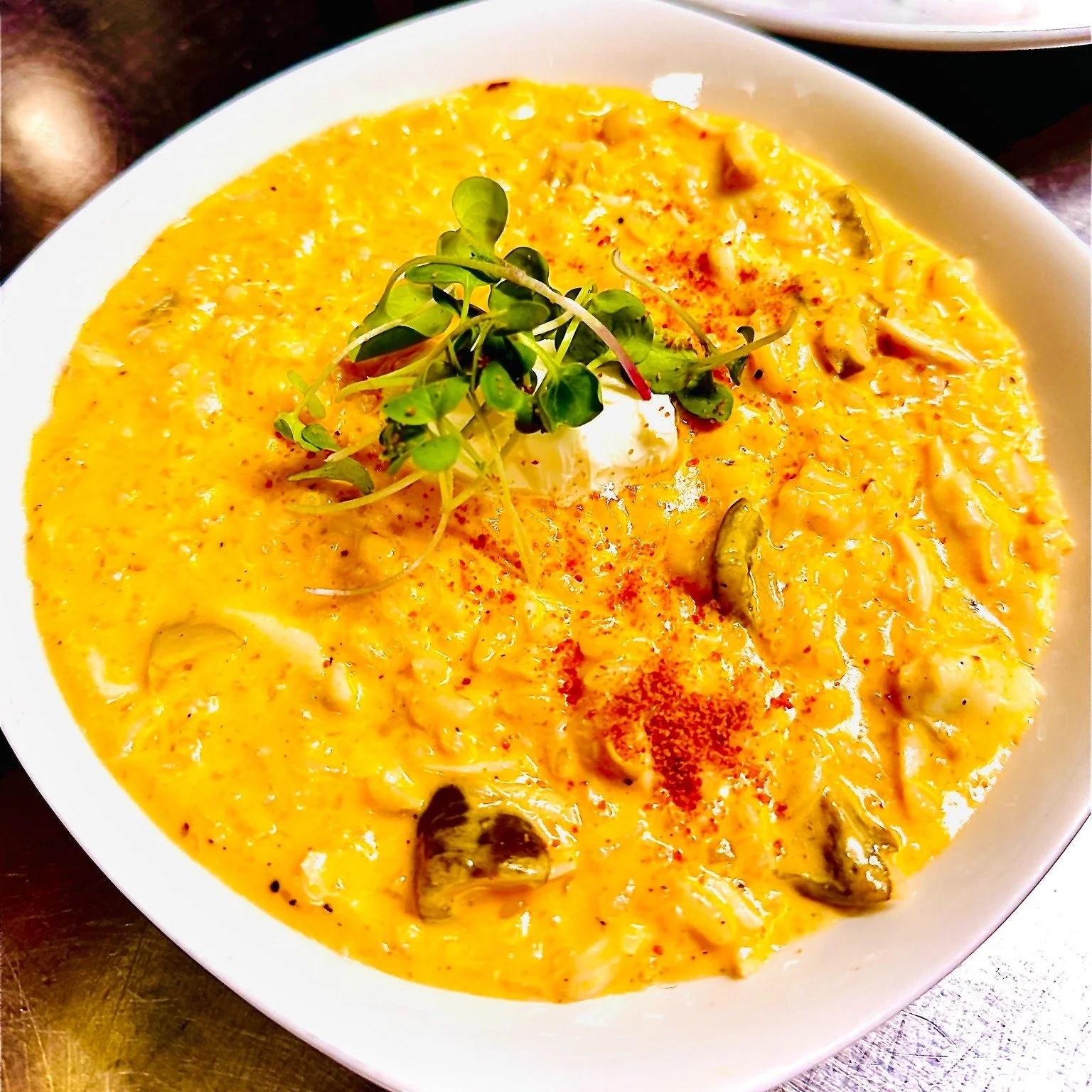 Some dishes ask you to slow down.
This week's risotto is one of them.

Carnaroli rice, patiently stirred and cooked perfectly al dente, becomes the canvas for the flavors of summer. A silky red bell pepper crema brings sweetness and warmth, while roa