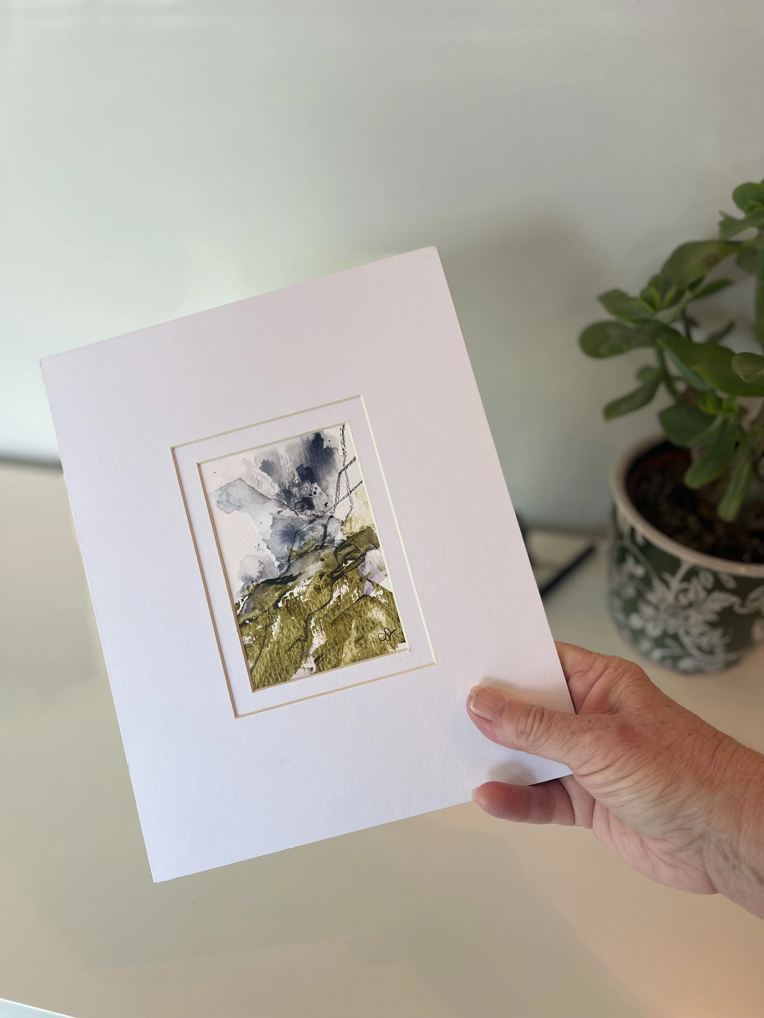 discordant-cries-painting-held-in-hand-size-reference.jpg