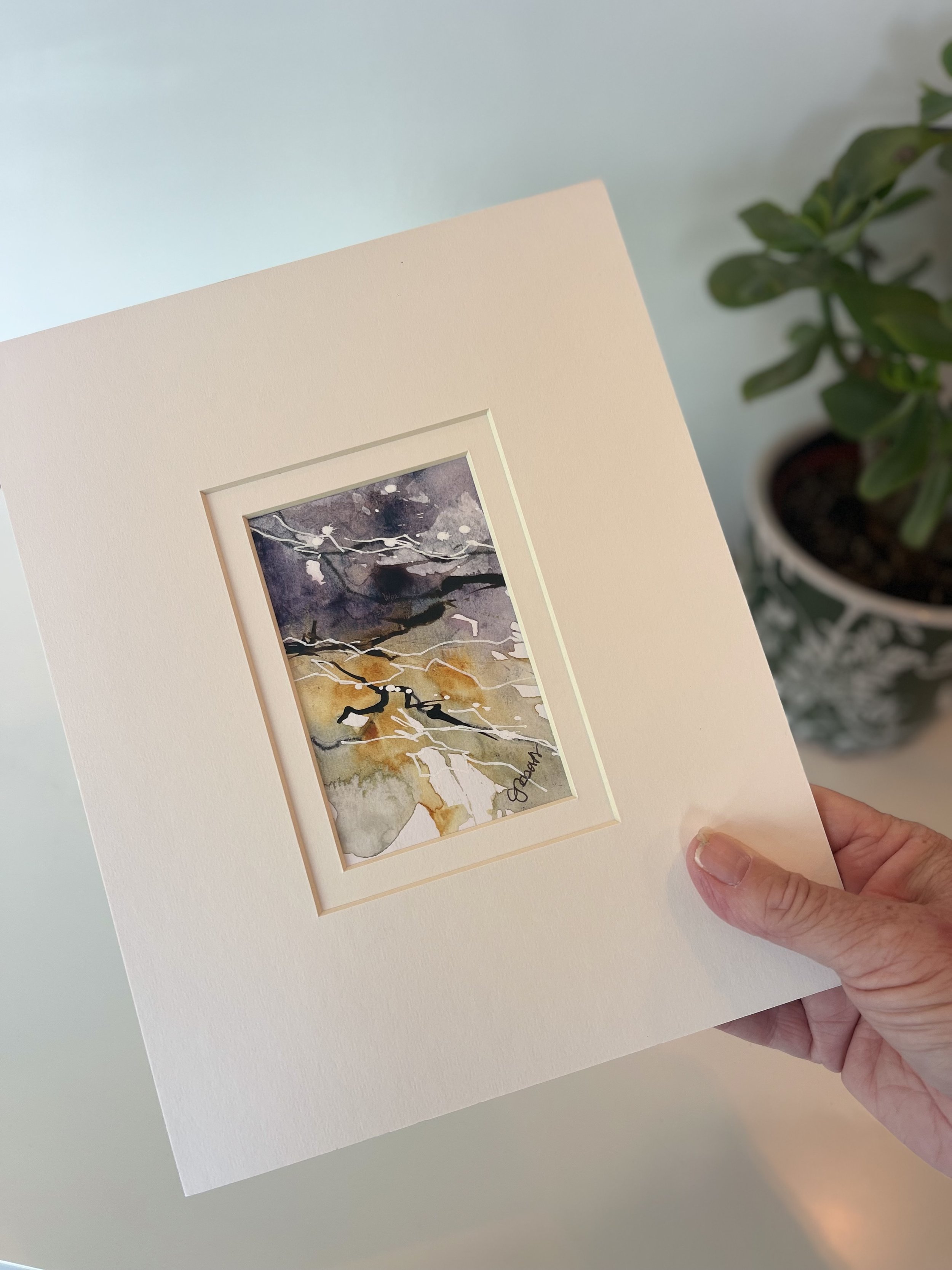 wild-sky-withered-moor-painting-held-in-hand .jpeg