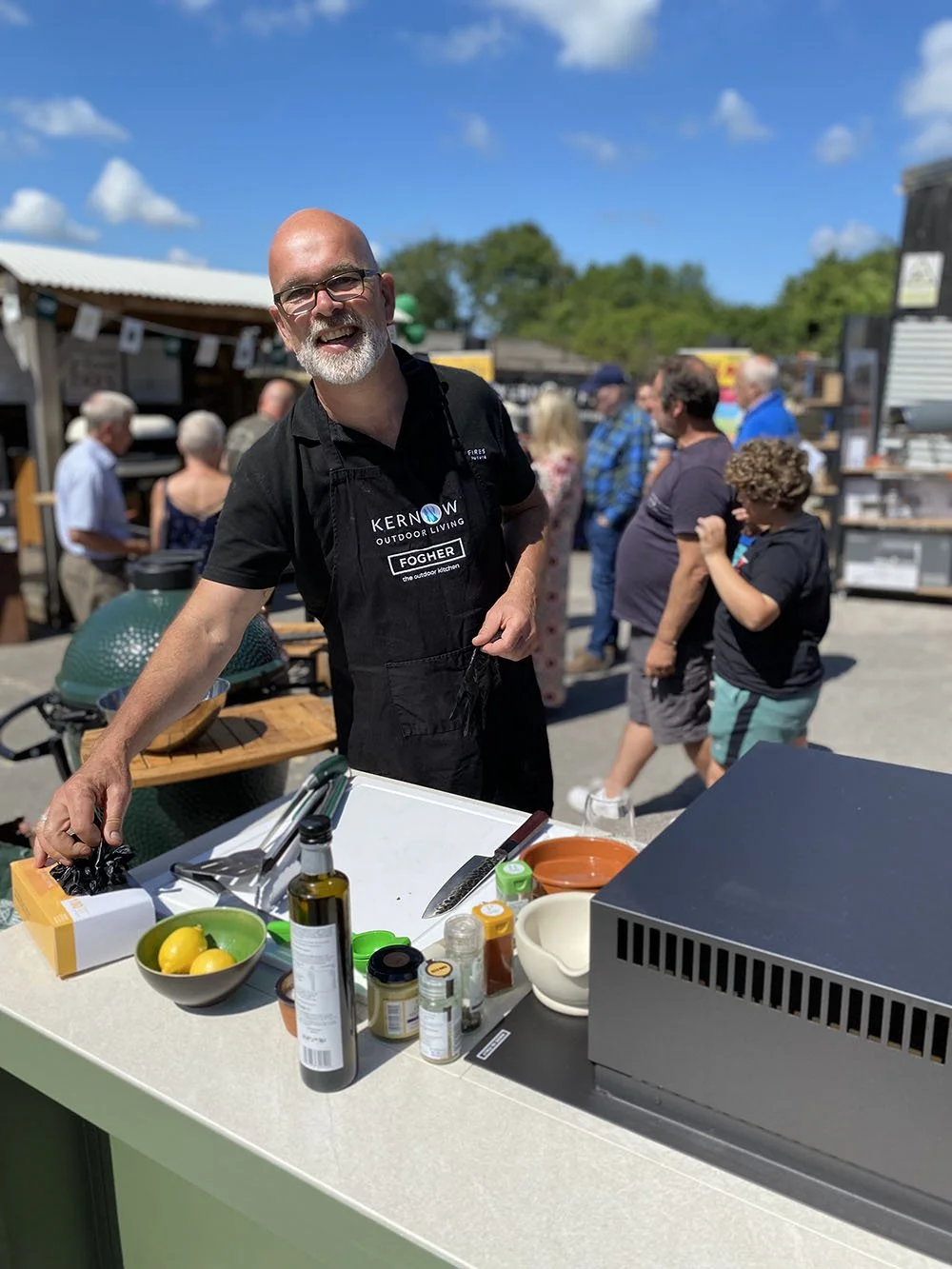 Simon cookin gup a storm at a Outdoor kitchen event