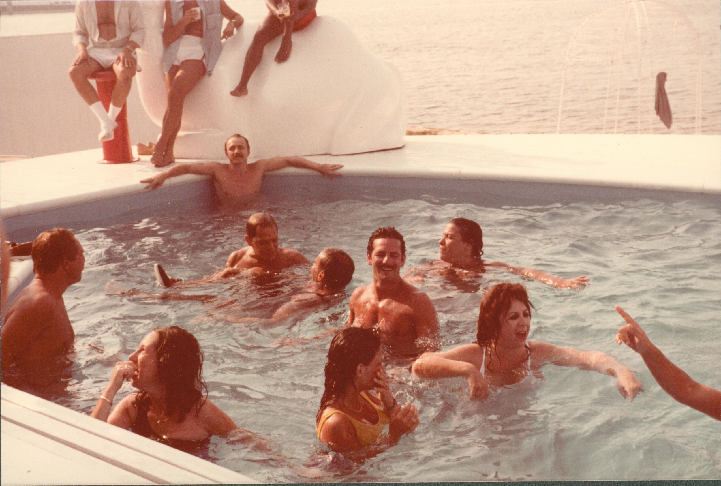 Gloria DeMann and friends in pool.jpg