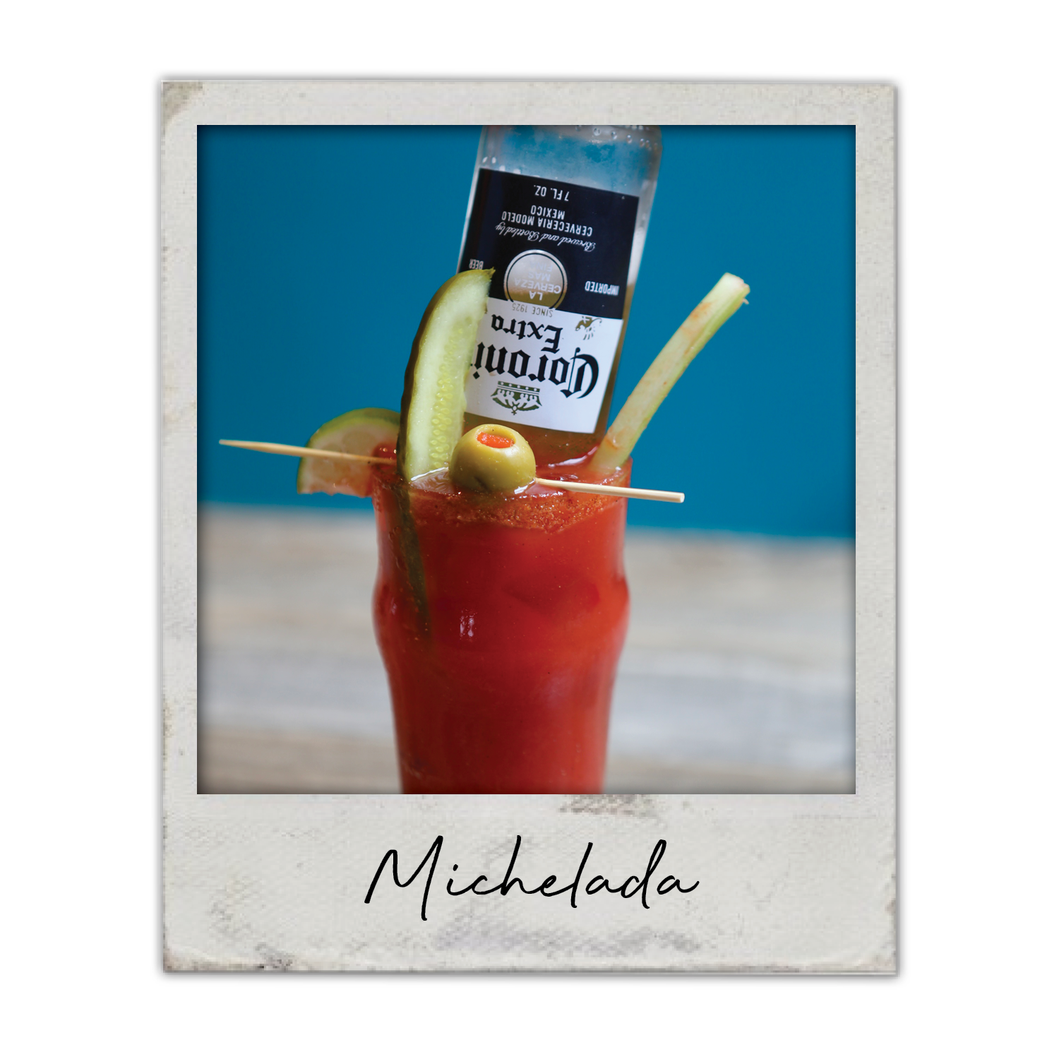 Michelada | The Breakfast Club USA, A beer cocktail with homemade bloody mix and a savory garnish, served in a tall glass.