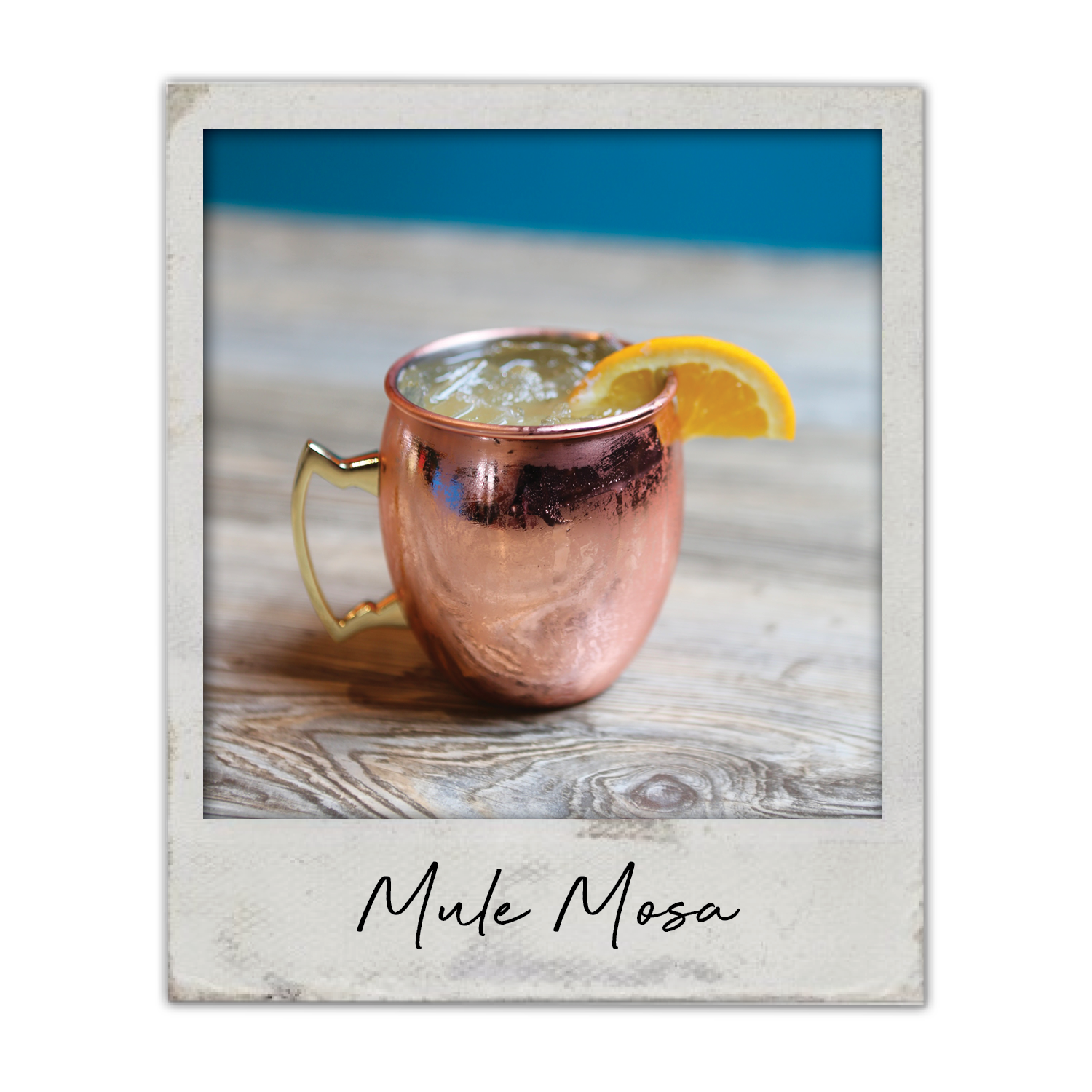 Mule Mosa | The Breakfast Club USA, A brunch cocktail with champagne, orange juice, vodka, and ginger beer served in a copper mug.