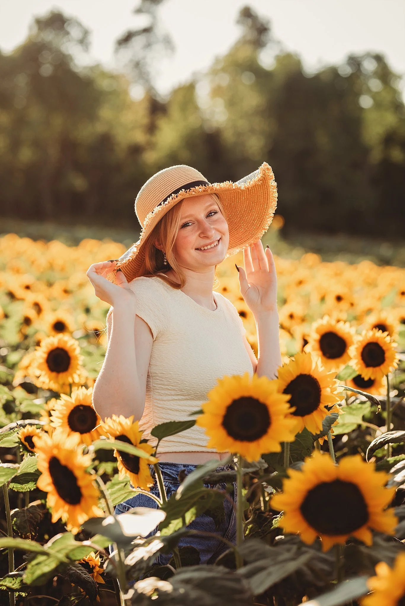 senior-girl-in-sunflower-field.jpg