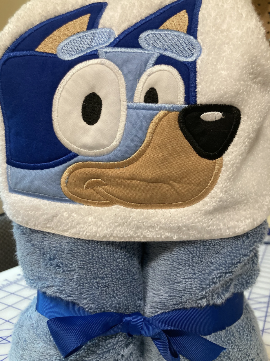 Cuddly Bluey towel from Etsy from FaithfulStitchesLisa