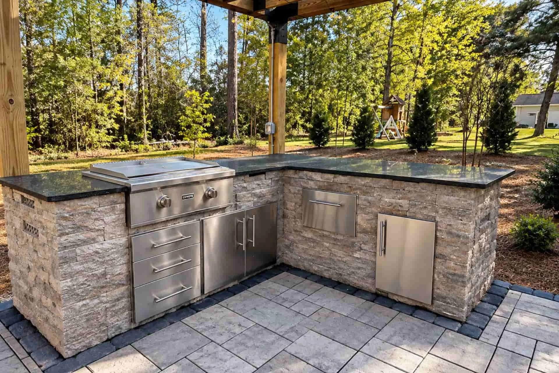 outdoor kitchen with stainless steel appliances