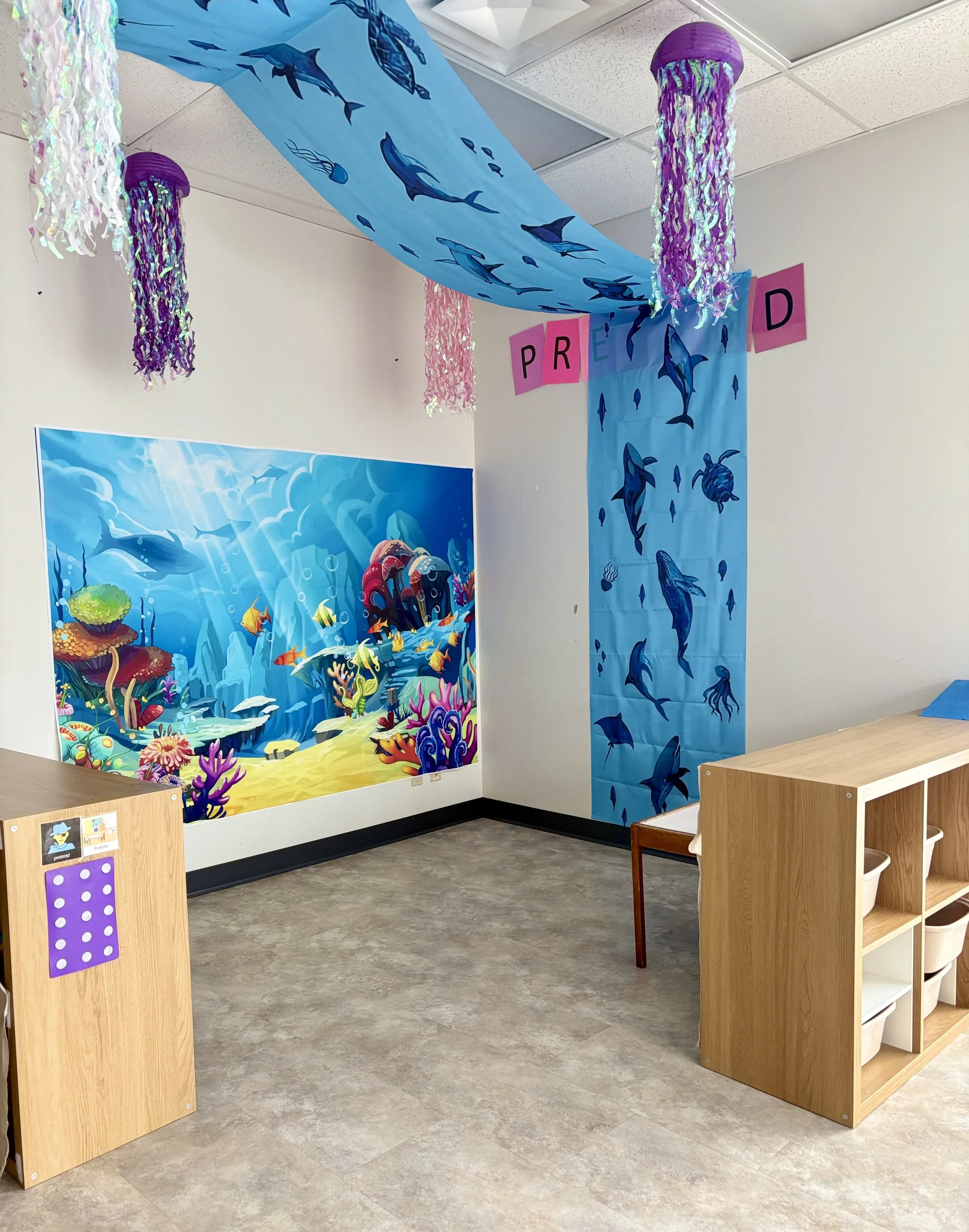 A new theme is introduced each month and our classrooms transform with books, toys, and activities to match. 